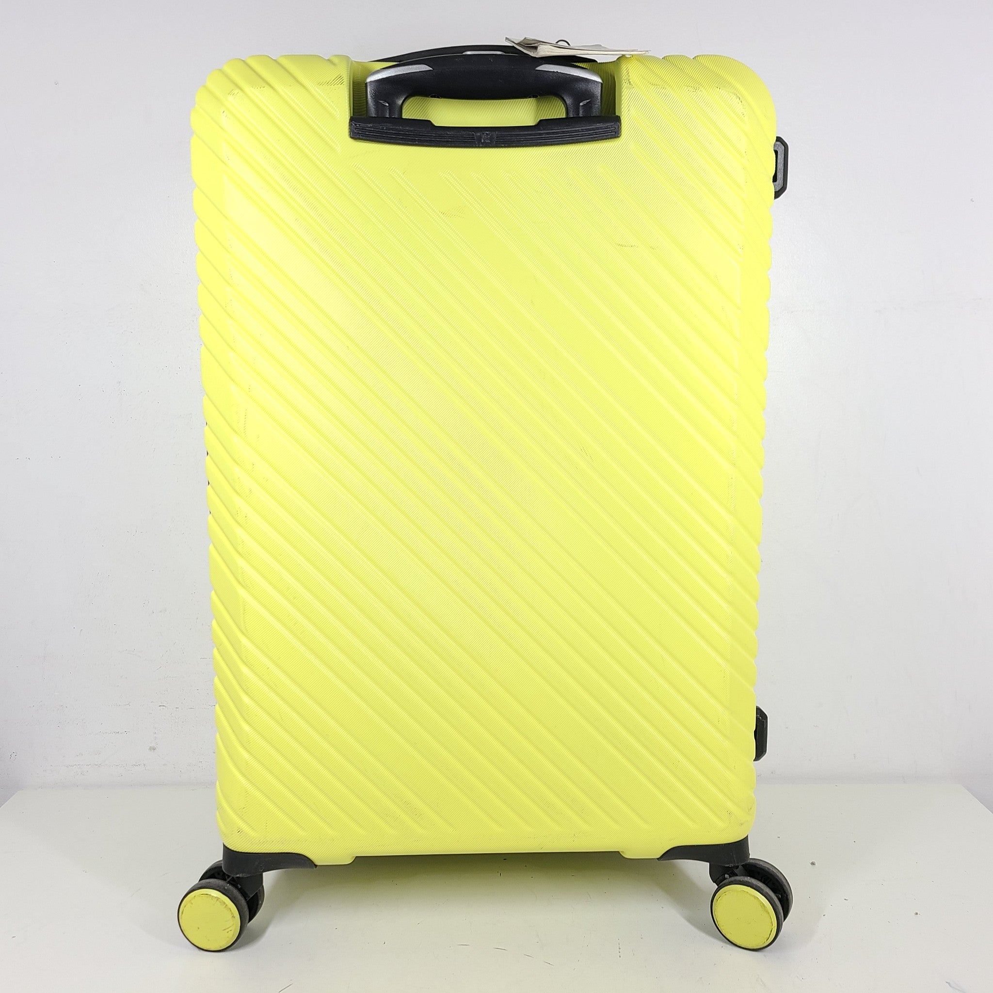 it luggage 27" Medium Spinner Expanding Hardshell Check In Luggage Light Yellow