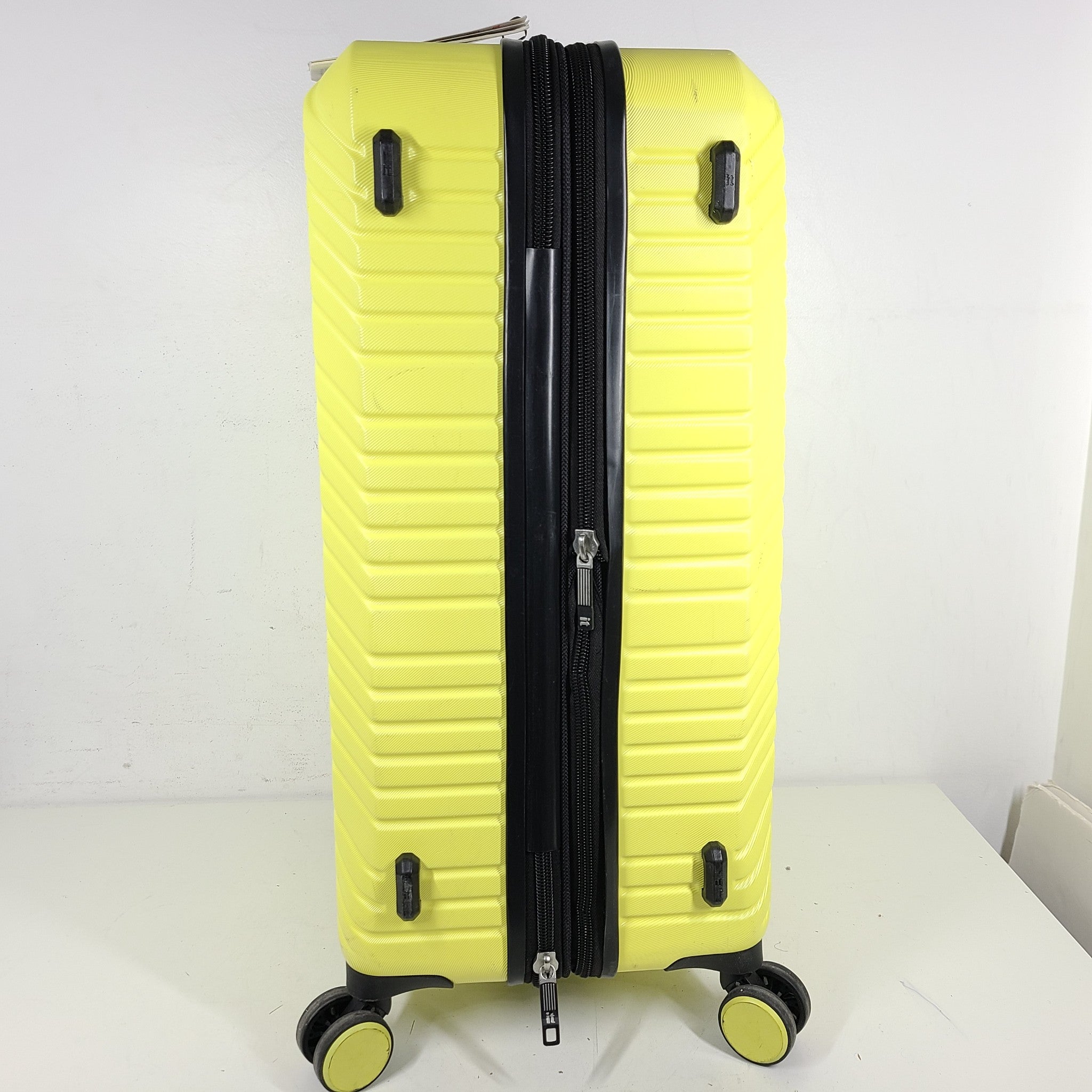 it luggage 27" Medium Spinner Expanding Hardshell Check In Luggage Light Yellow