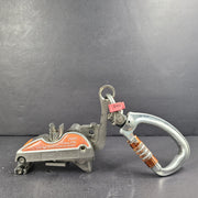 Metal tool with a carabiner on a gray background