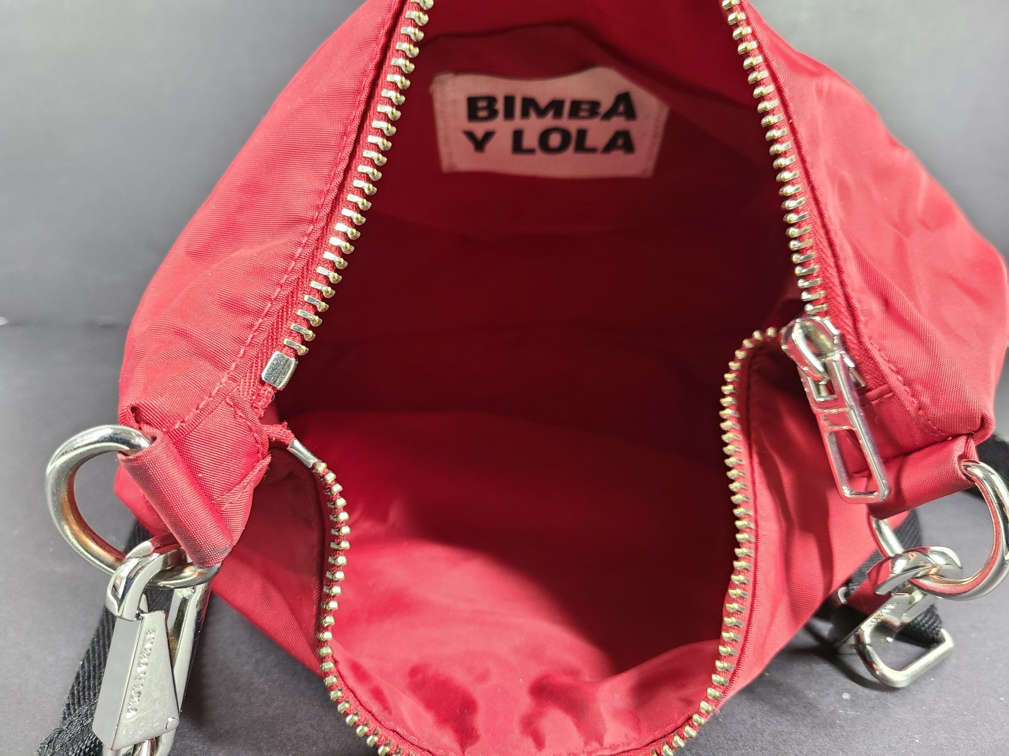 Bimba Y Lola Medium Banana Crossbody Bag Zip Closure Red