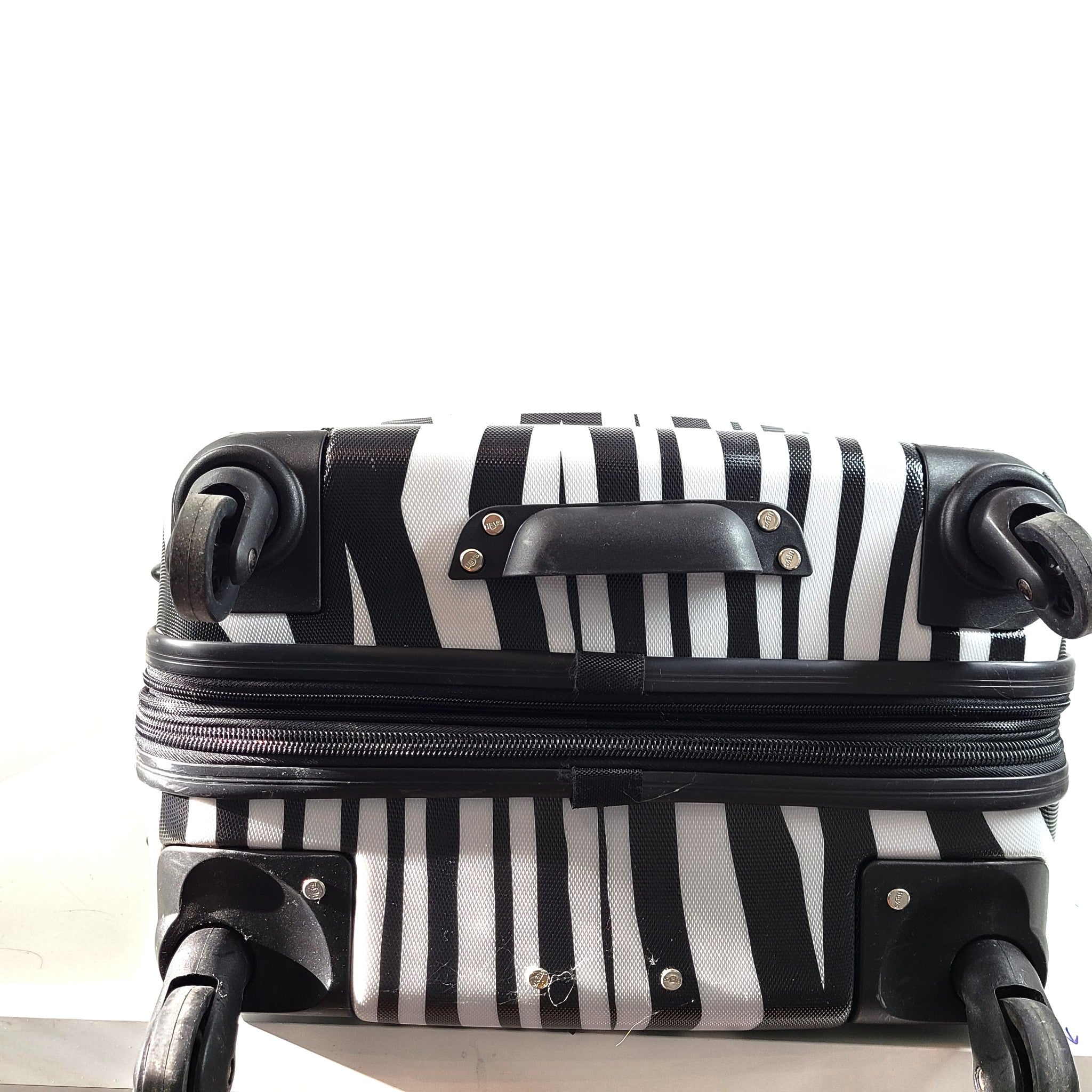 Heys 26" Spinner Luggage Hardside PC Expandable Zebra Print Black White