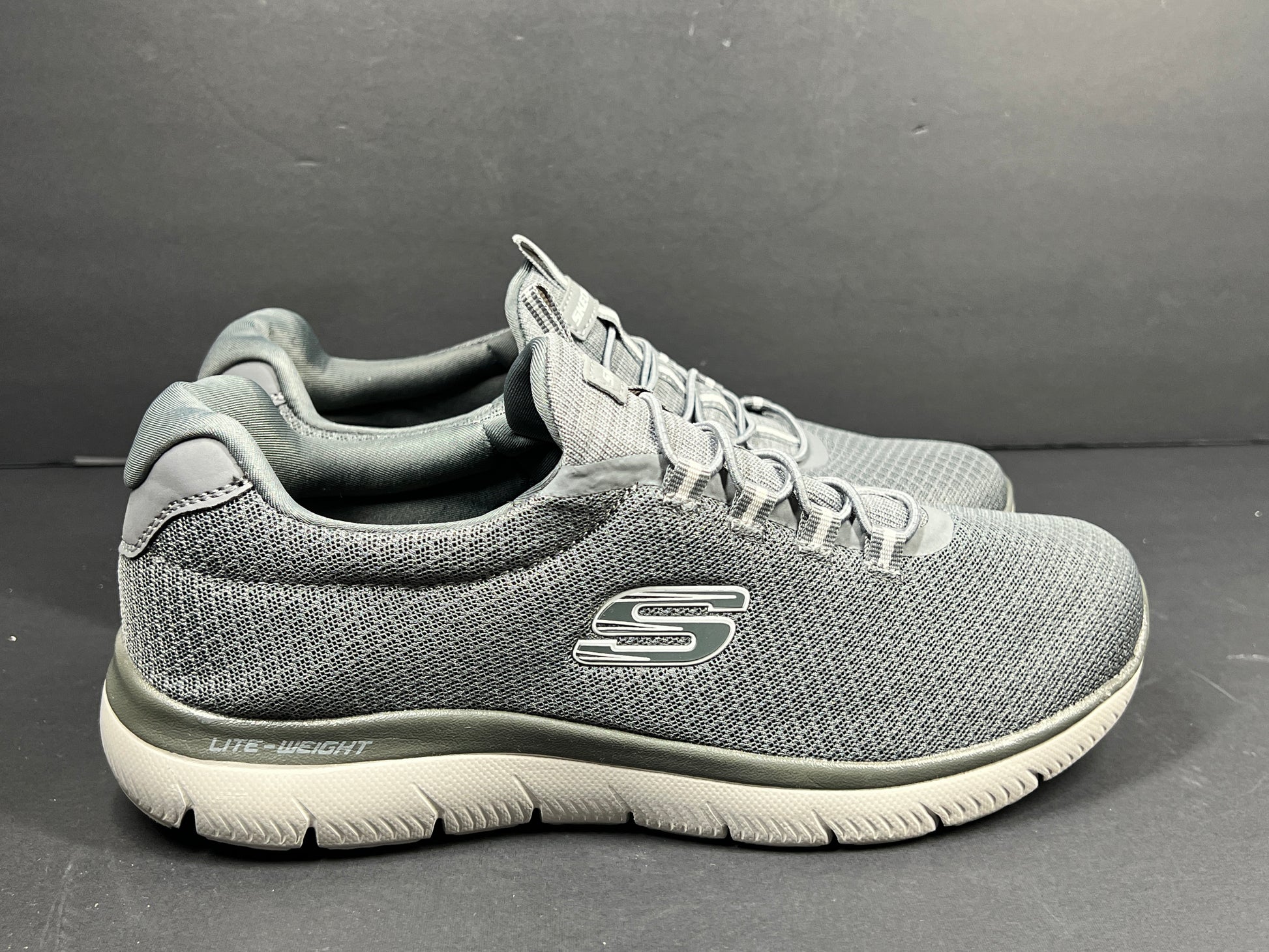 A pair of men's Skechers Wide Fit Memory Foam Charcoal Sneakers