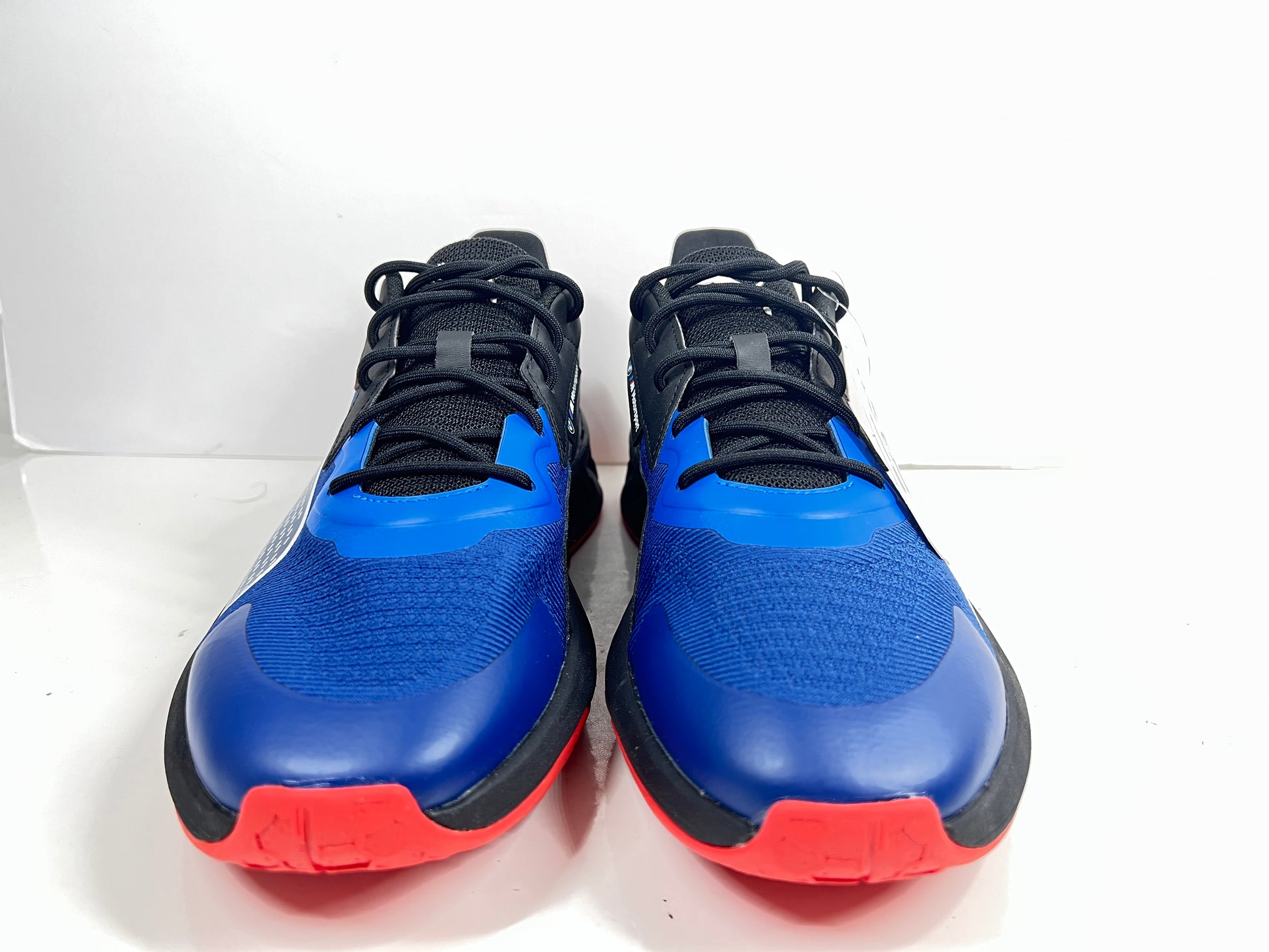 A stylish pair of Puma BMW MMS X-Ray 2 Sneakers in Blue, Black, and Red colors