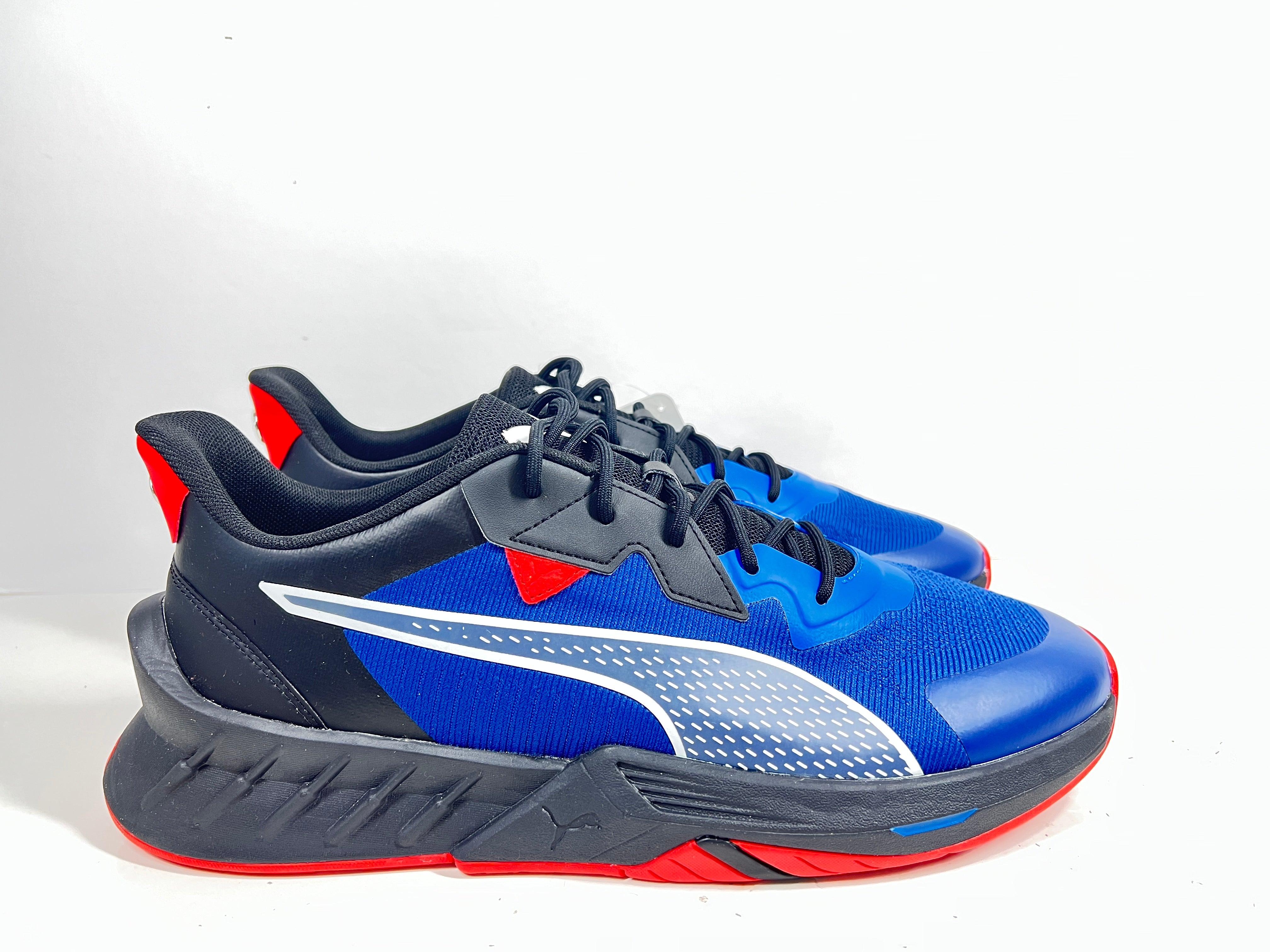 A stylish pair of Puma BMW MMS X-Ray 2 Sneakers in Blue, Black, and Red colors