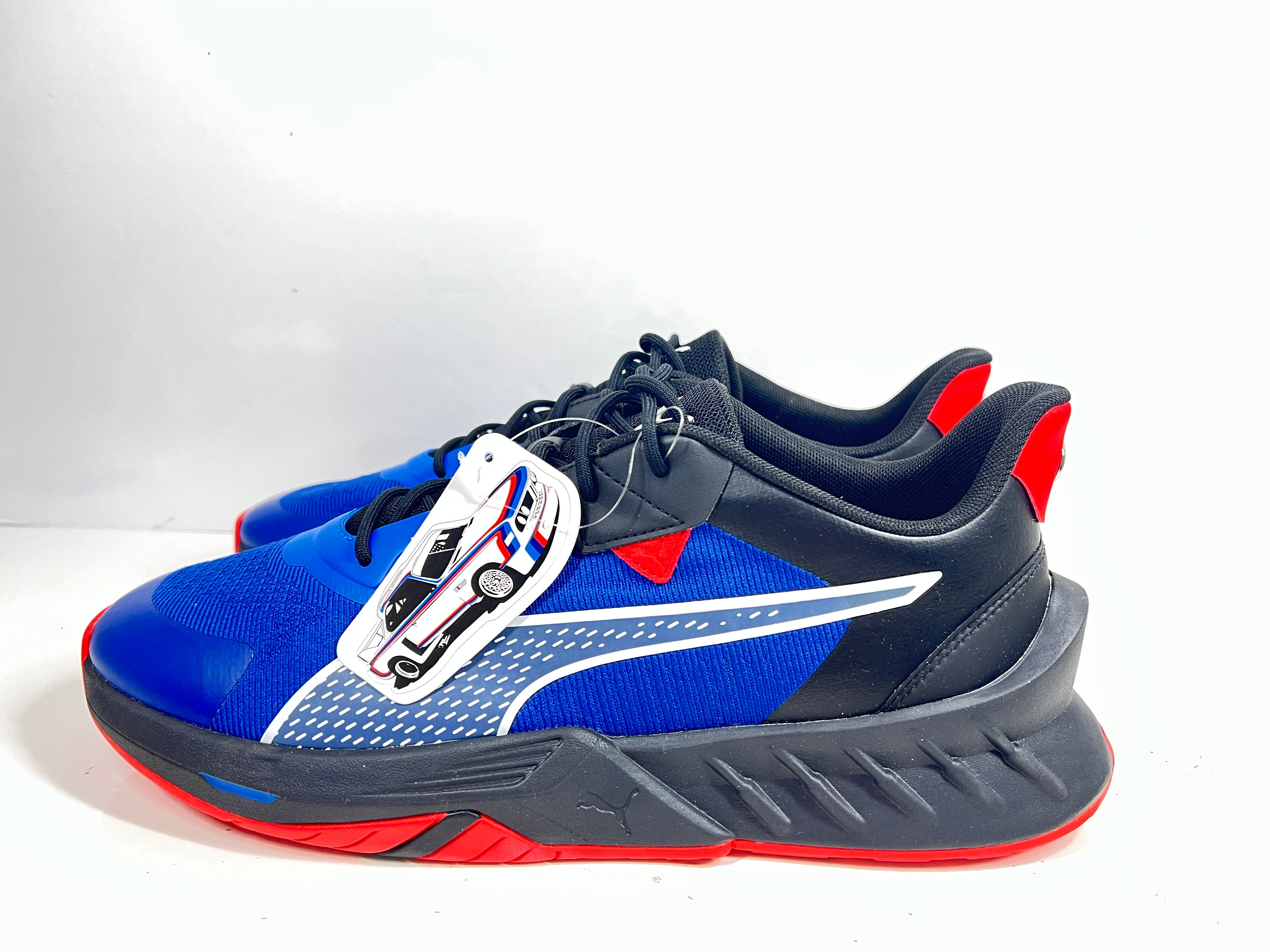 A stylish pair of Puma BMW MMS X-Ray 2 Sneakers in Blue, Black, and Red colors