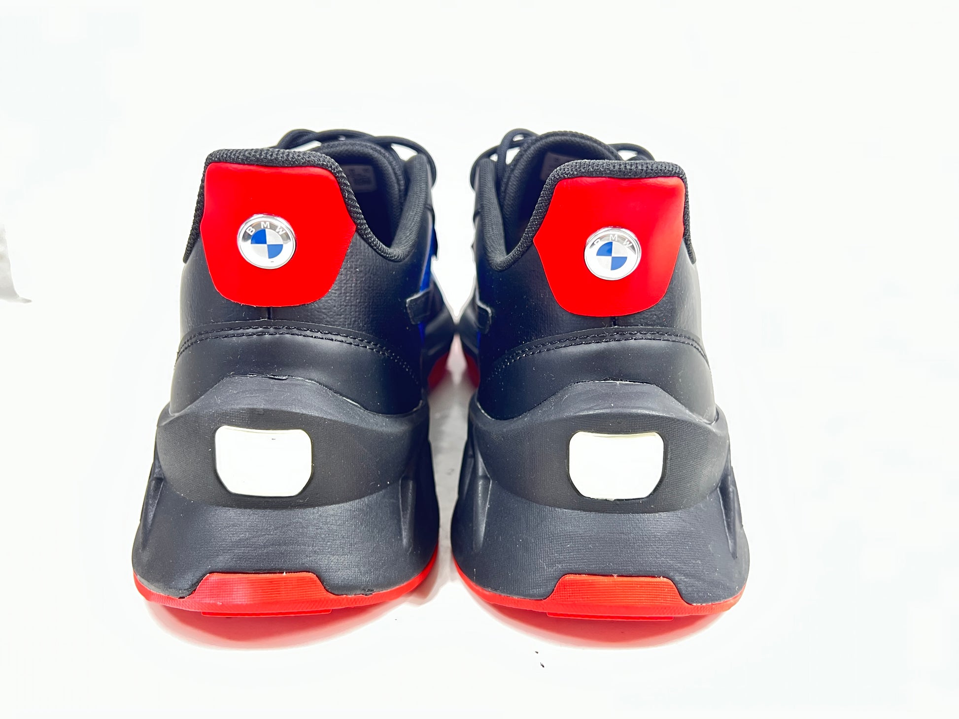 A stylish pair of Puma BMW MMS X-Ray 2 Sneakers in Blue, Black, and Red colors