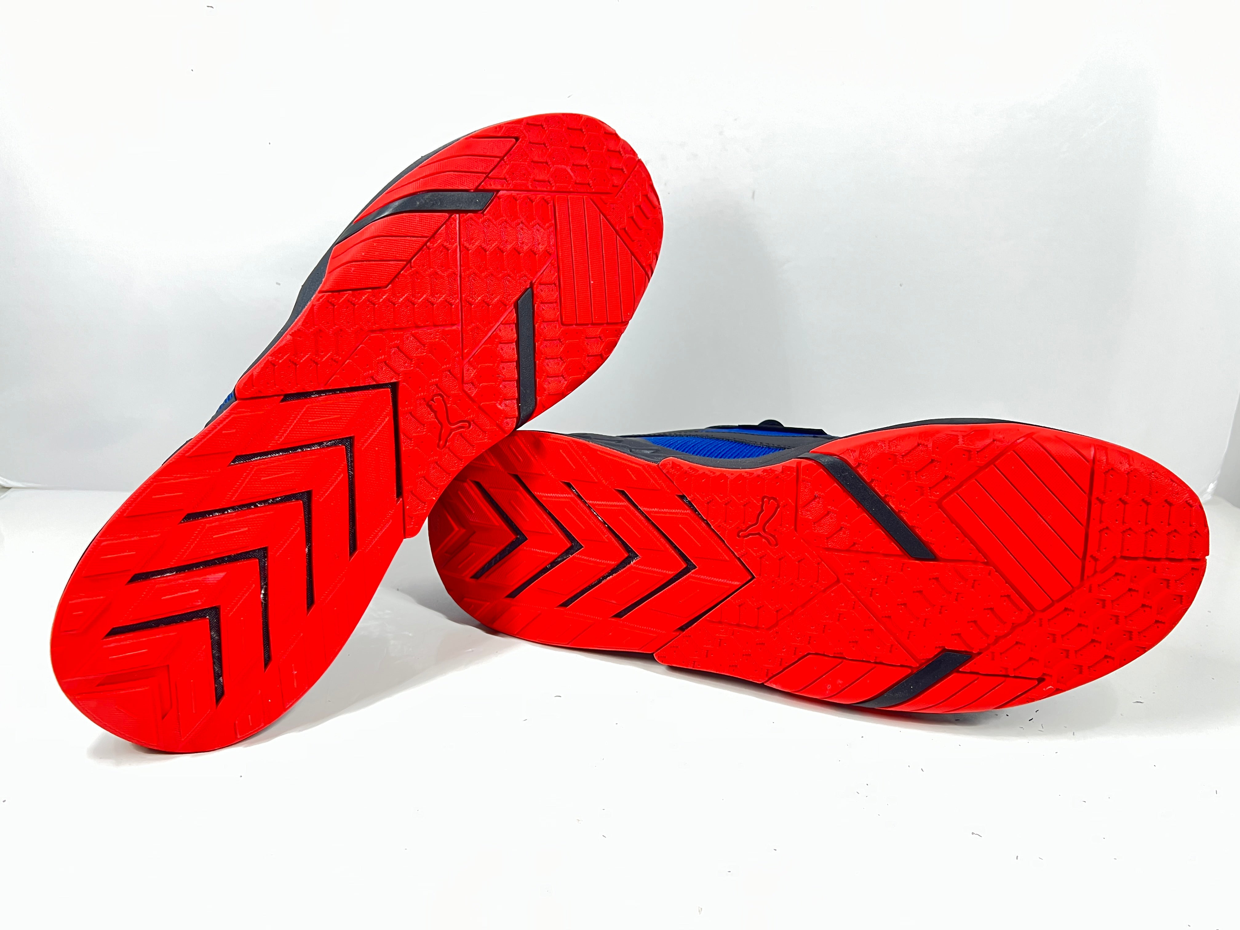 A stylish pair of Puma BMW MMS X-Ray 2 Sneakers in Blue, Black, and Red colors