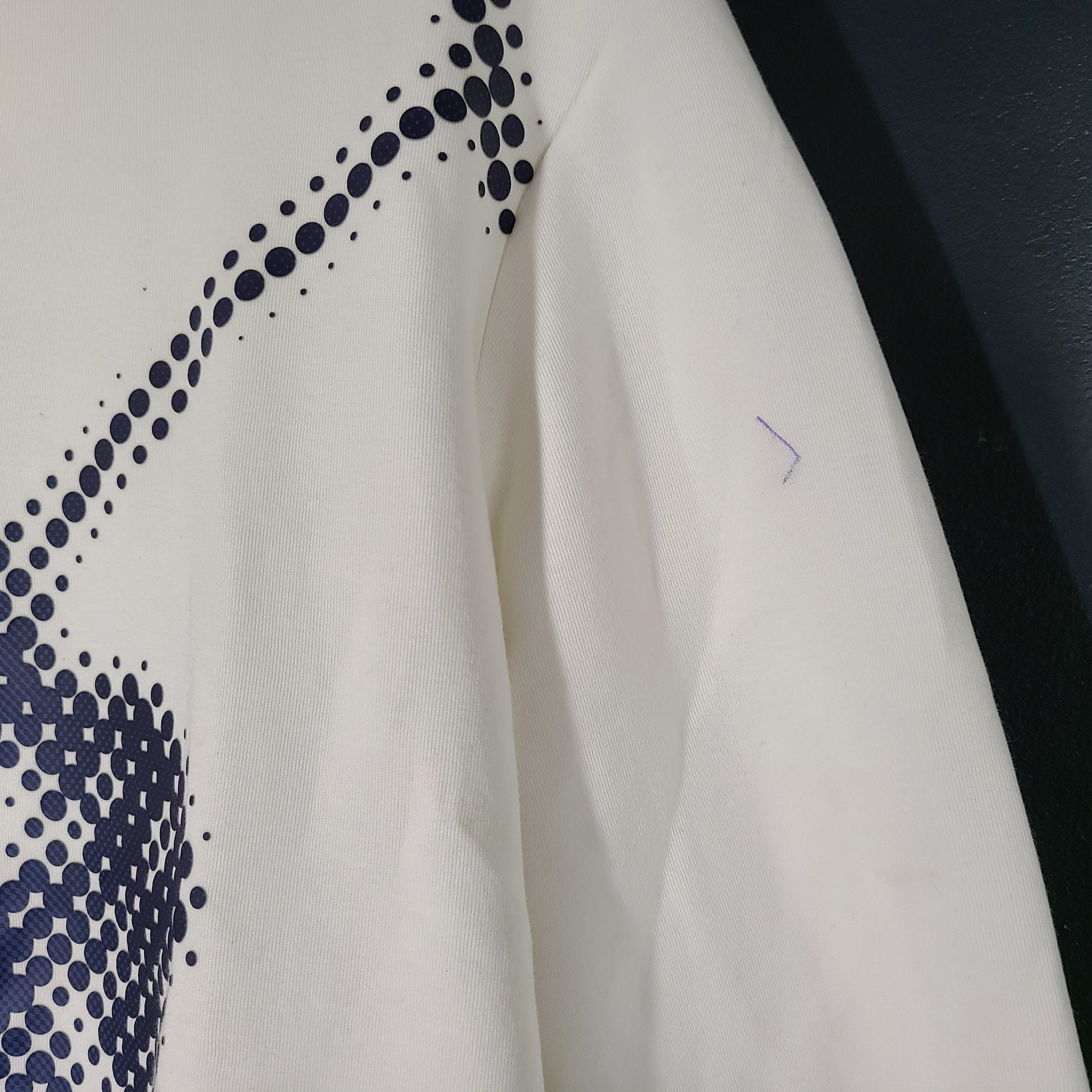 A cream men's hoodie with blue graphic by Polo Ralph Lauren