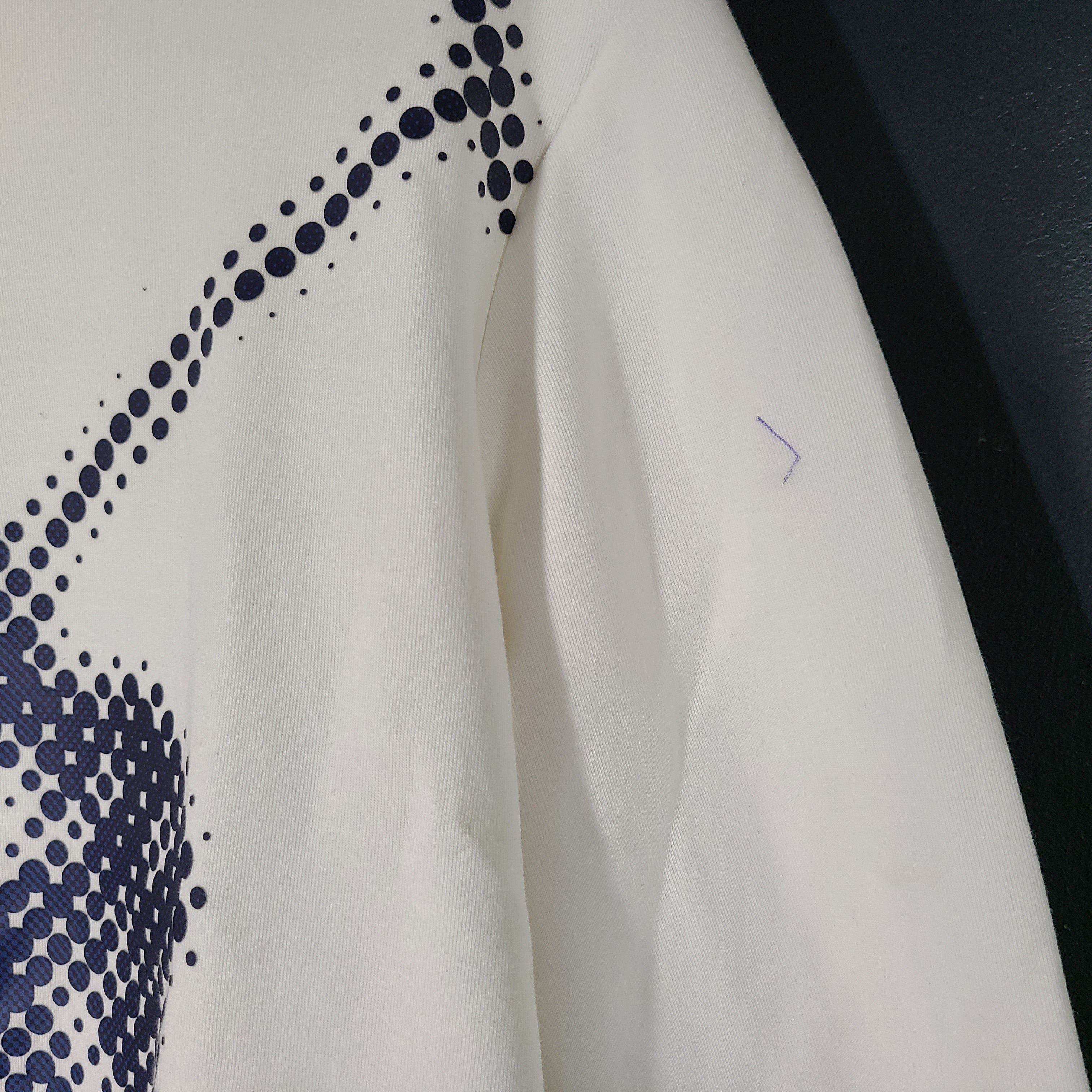 A cream men's hoodie with blue graphic by Polo Ralph Lauren