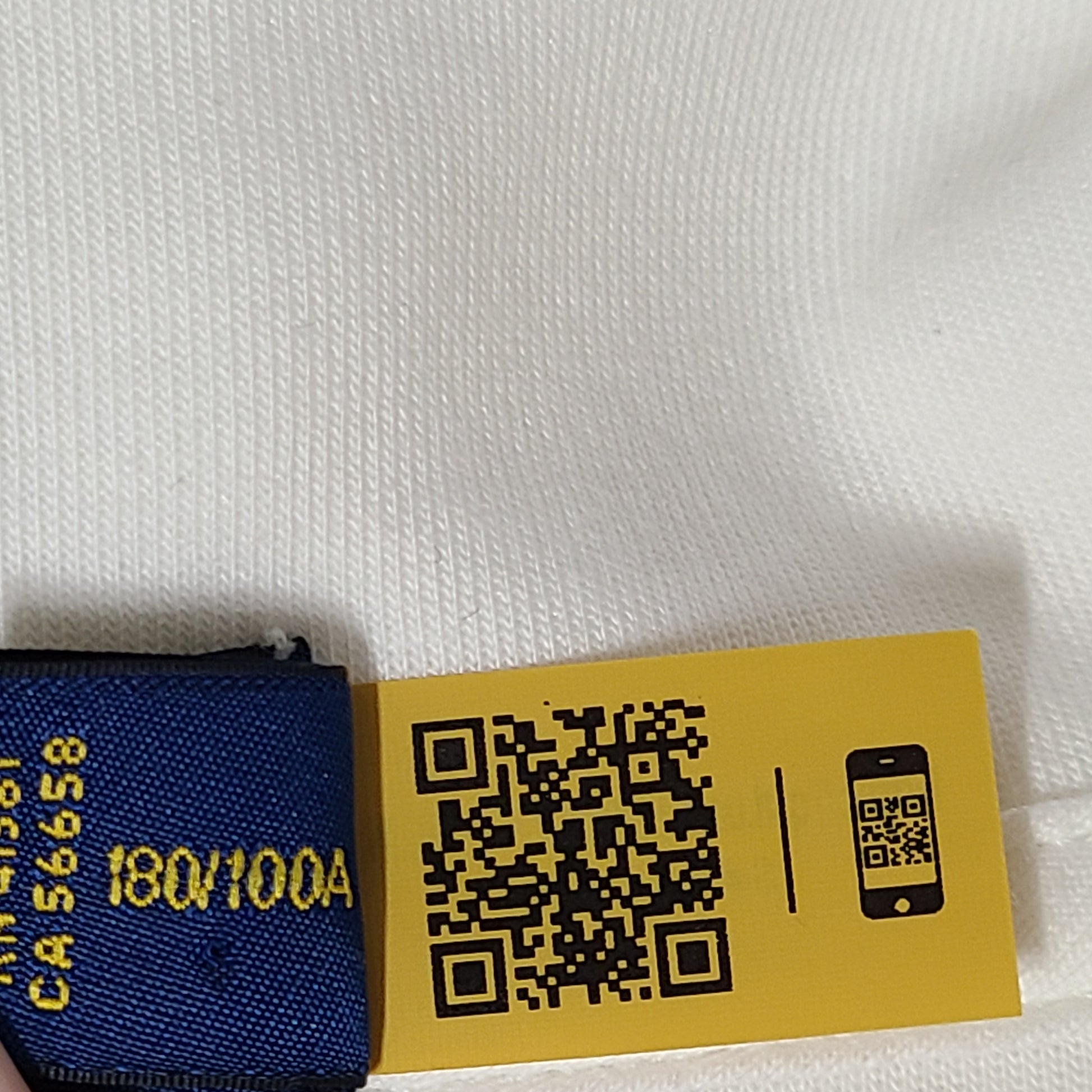 A cream men's hoodie with blue graphic by Polo Ralph Lauren