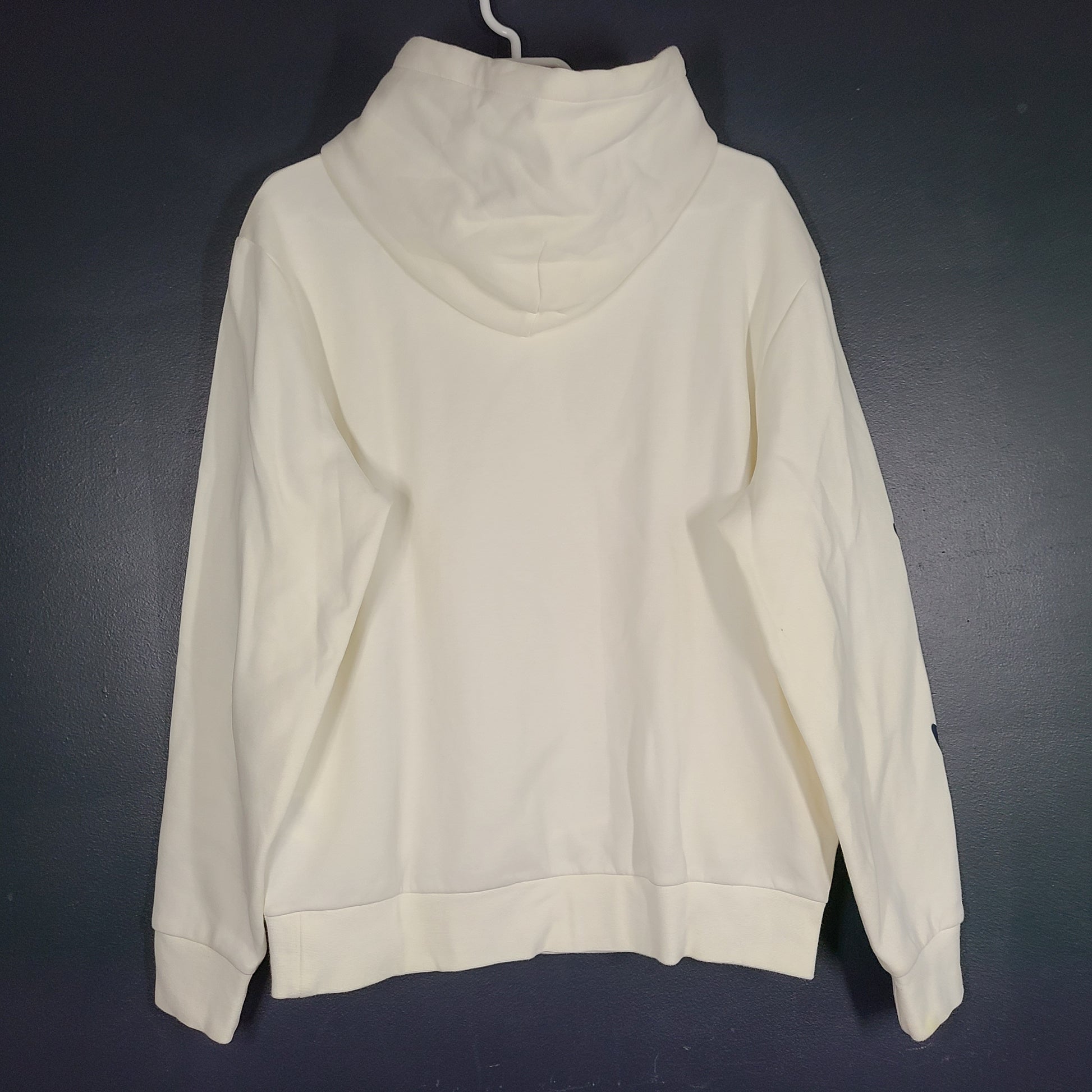 A cream men's hoodie with blue graphic by Polo Ralph Lauren