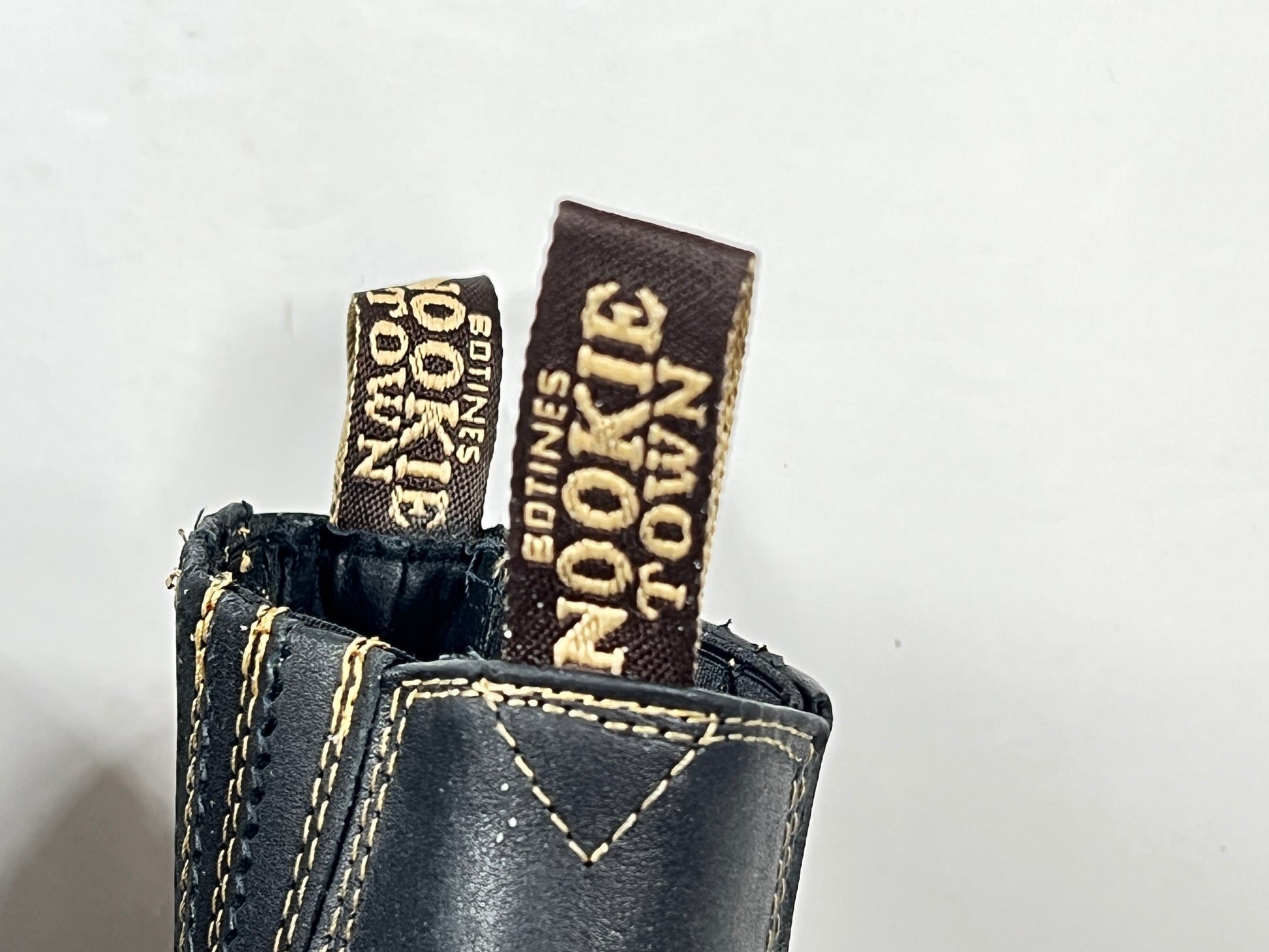 A pair of black leather women's boots by Nookie Town.