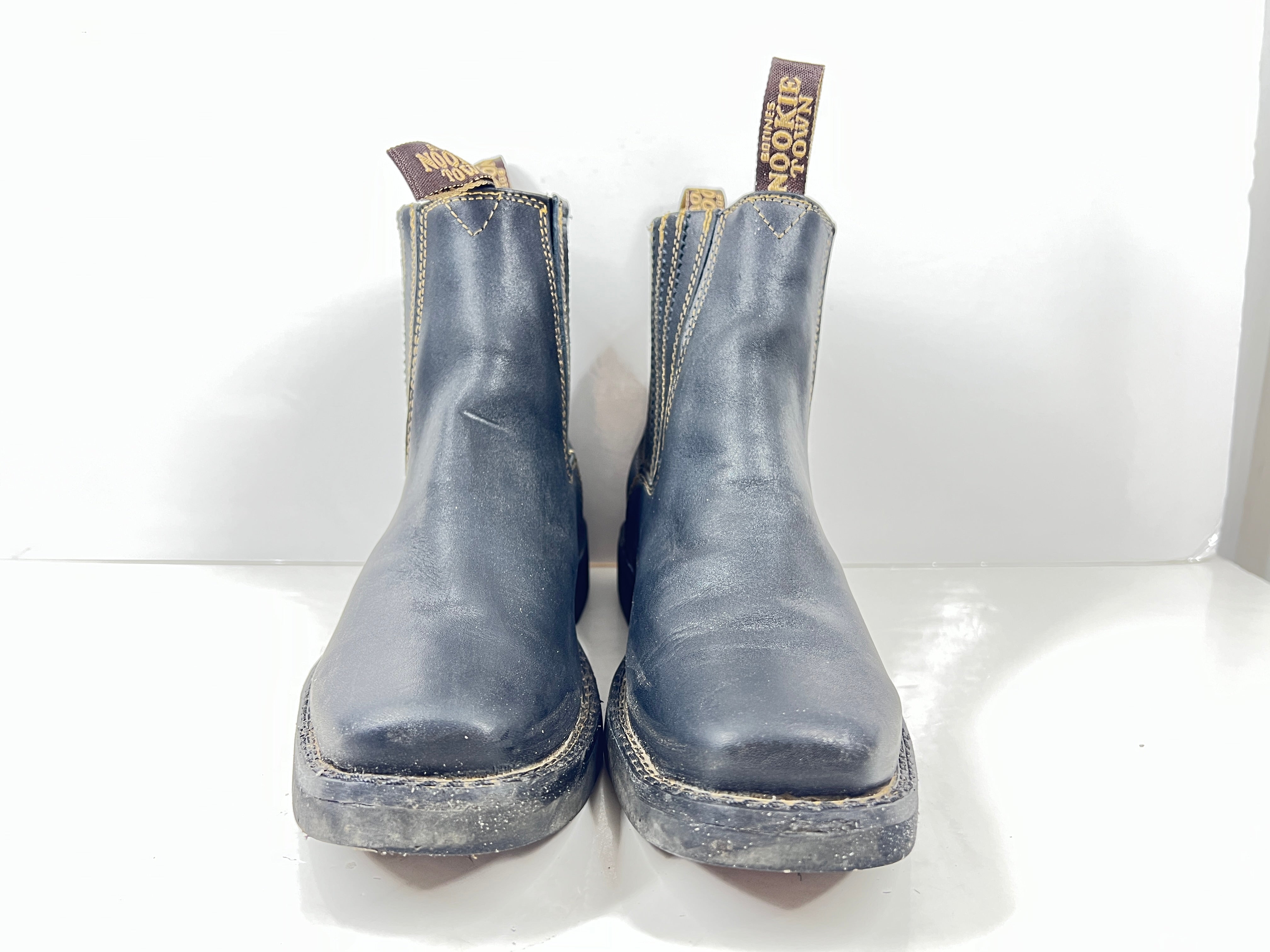 A pair of black leather women's boots by Nookie Town.