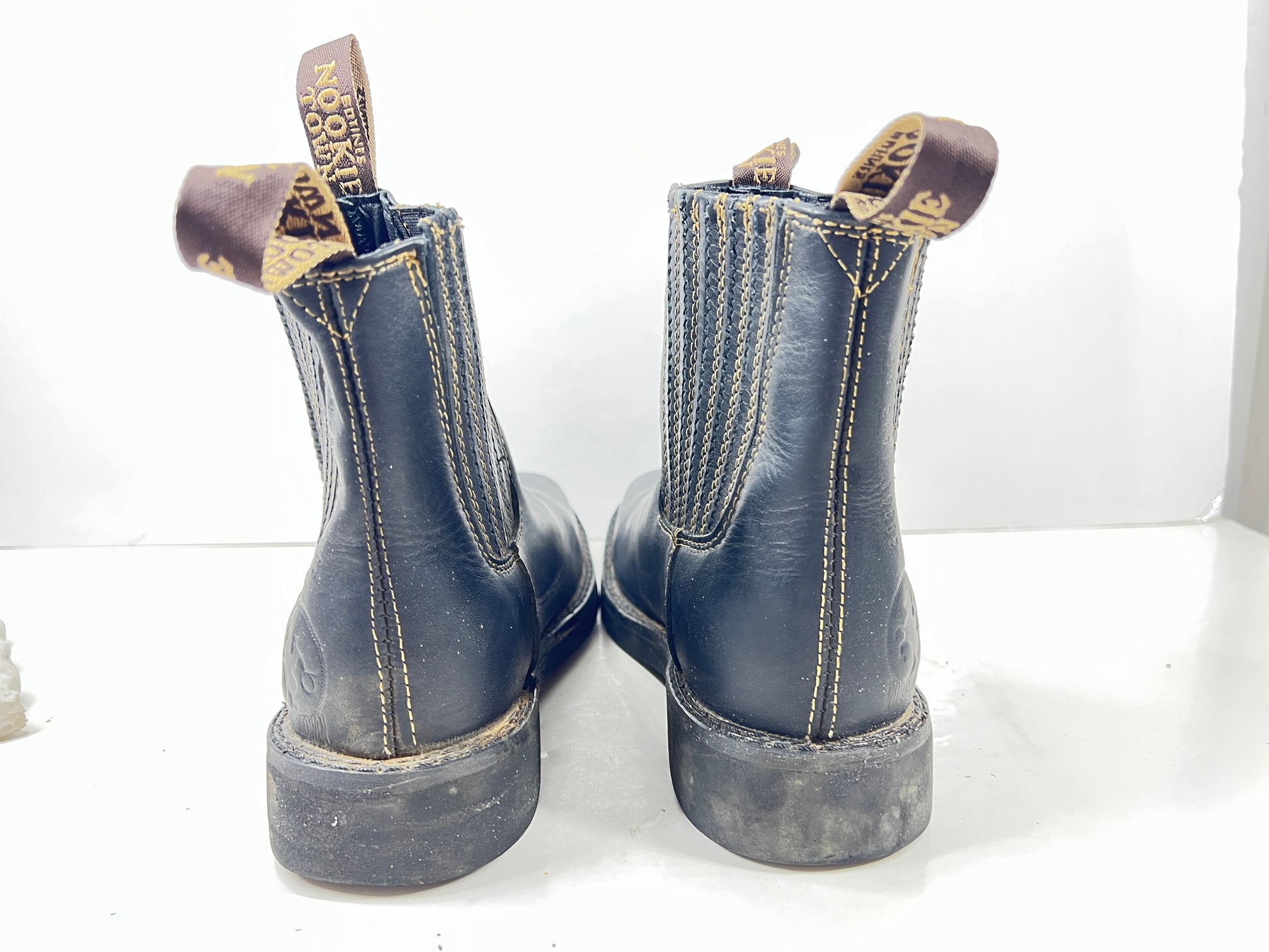 A pair of black leather women's boots by Nookie Town.