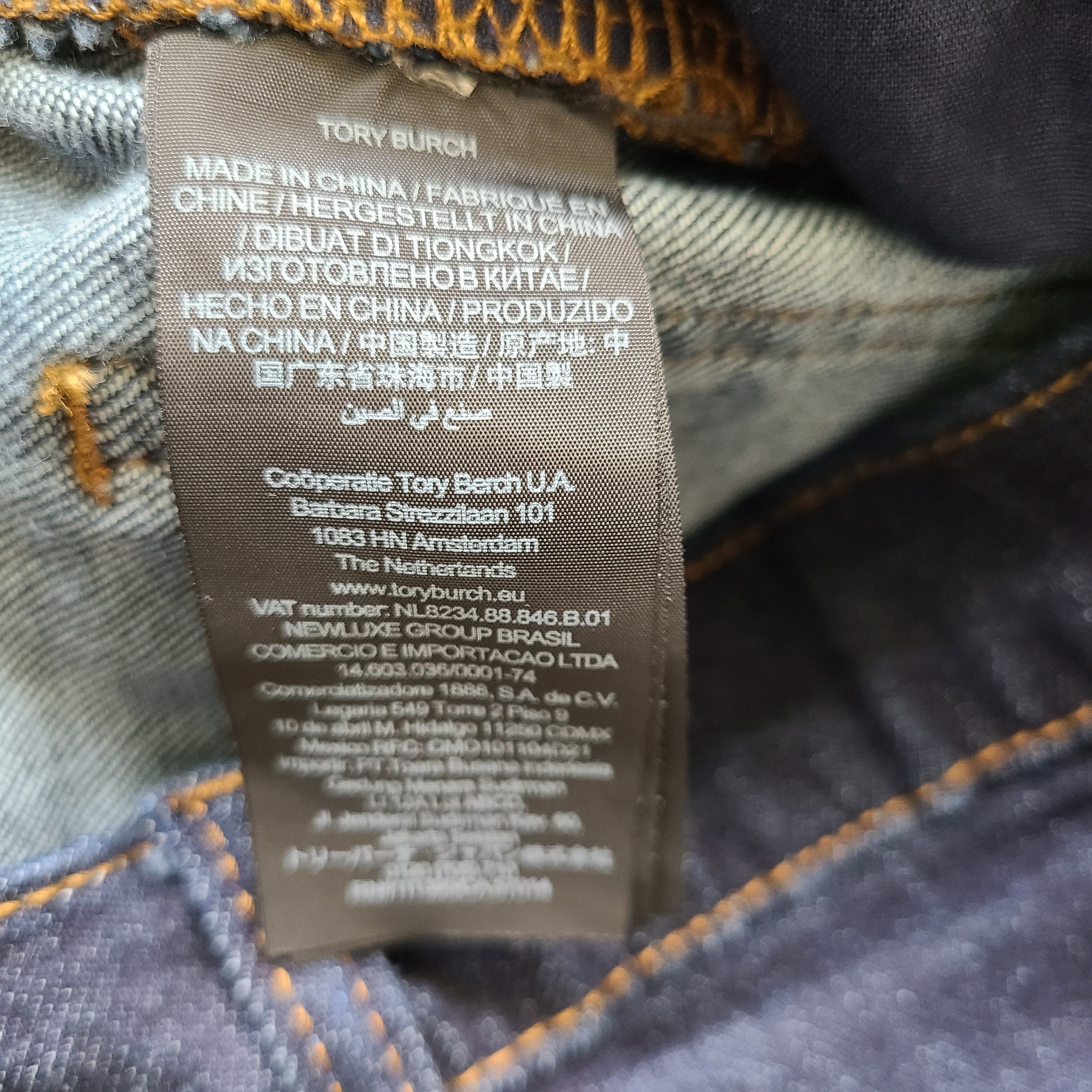 A pair of dark denim women's high-rise skinny jeans from Tory Burch