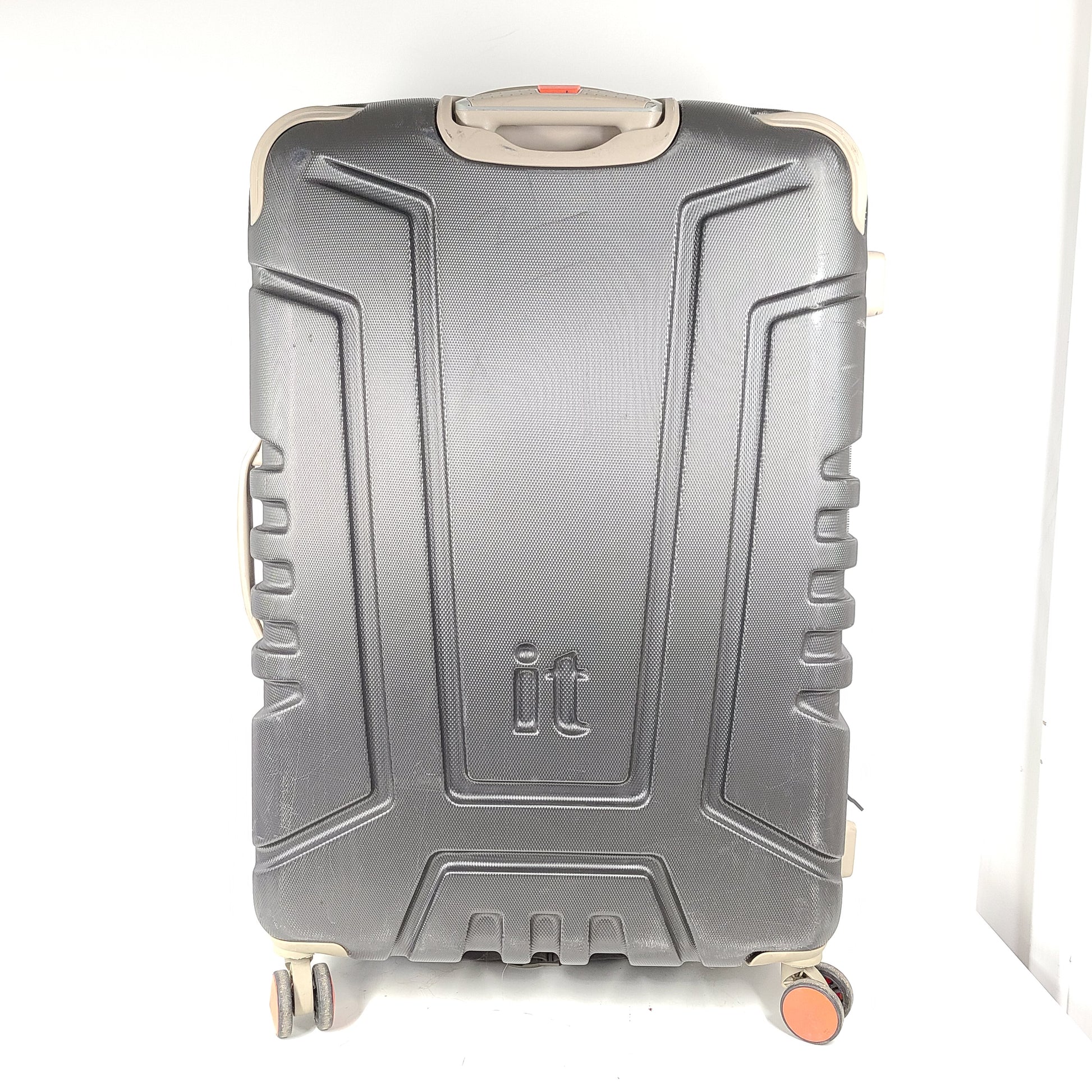 A red hard shell spinner suitcase by it Luggage