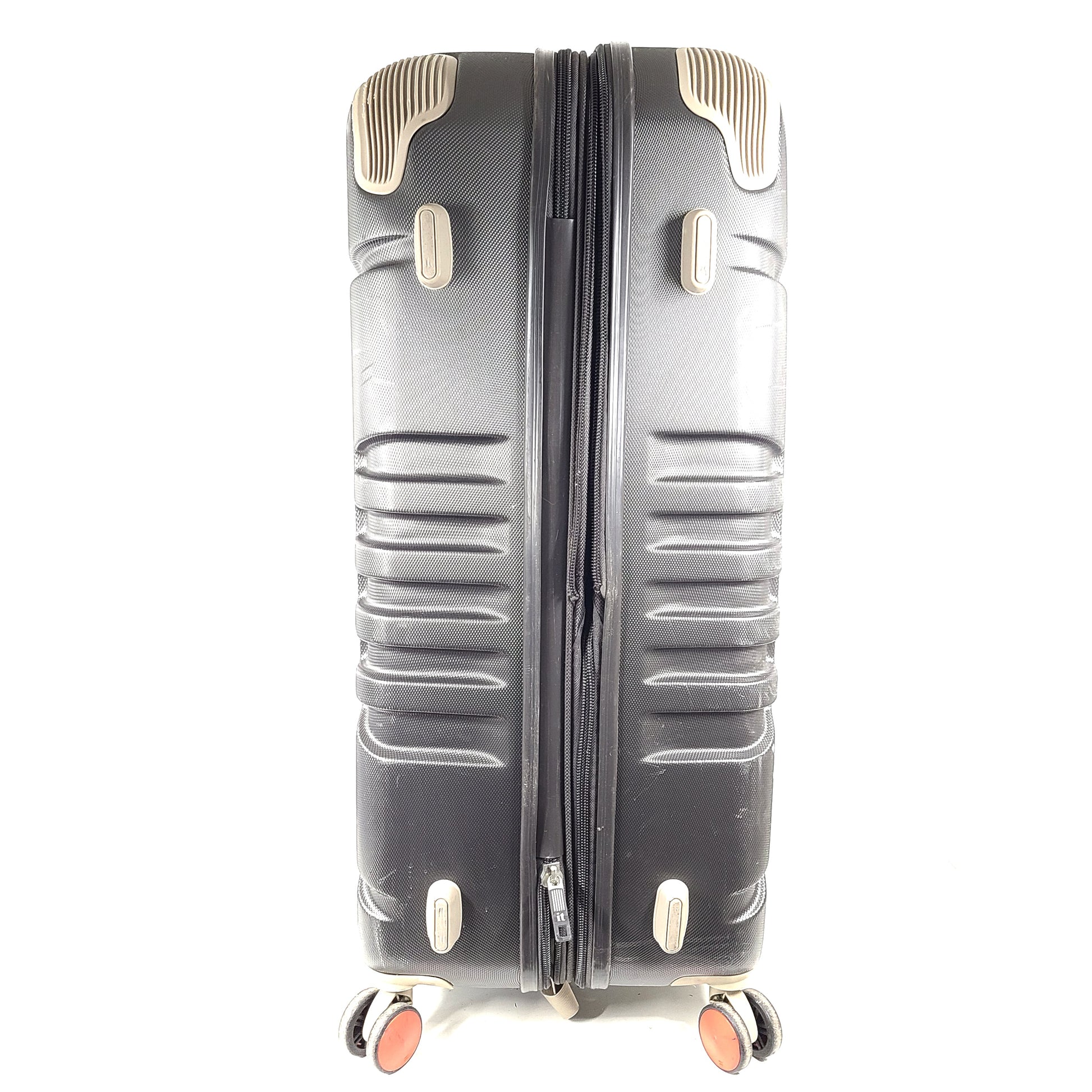 A red hard shell spinner suitcase by it Luggage