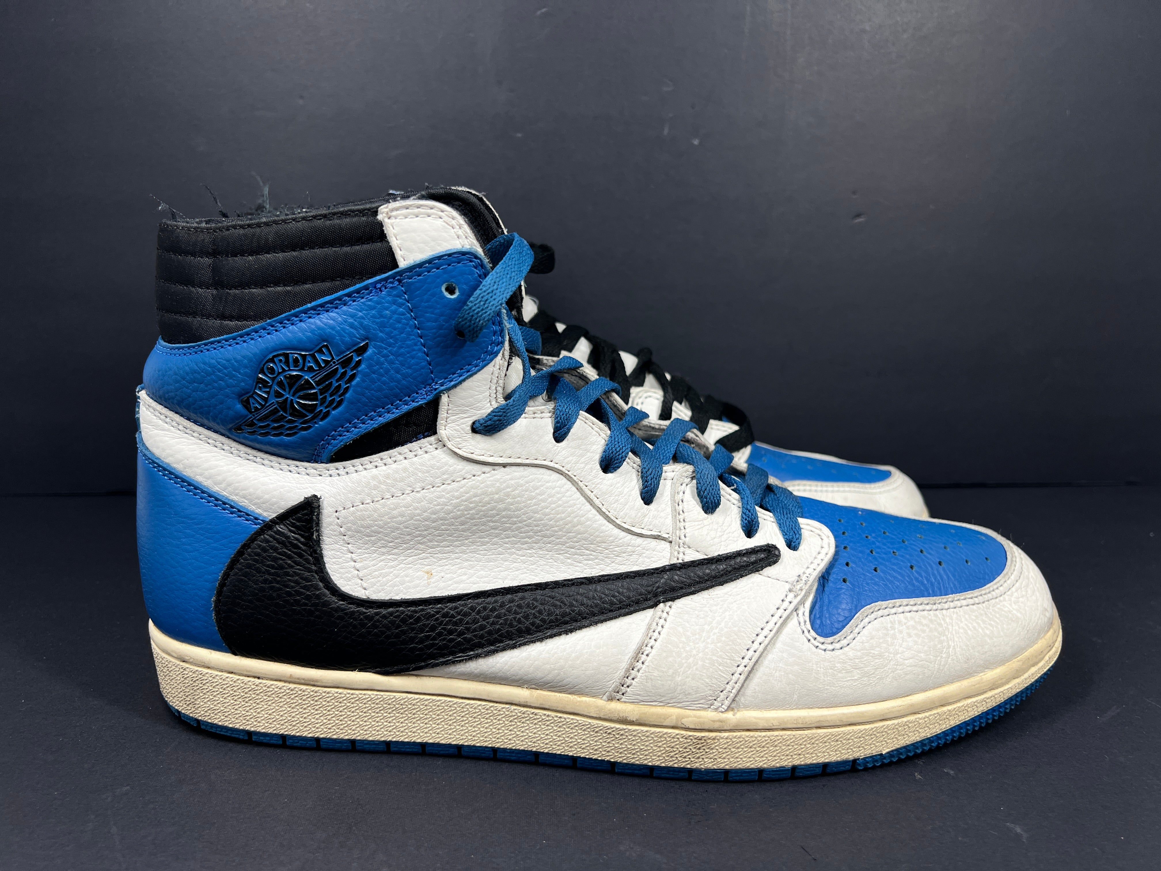 A pair of blue Nike Air Jordan 1 Retro High OG sneakers