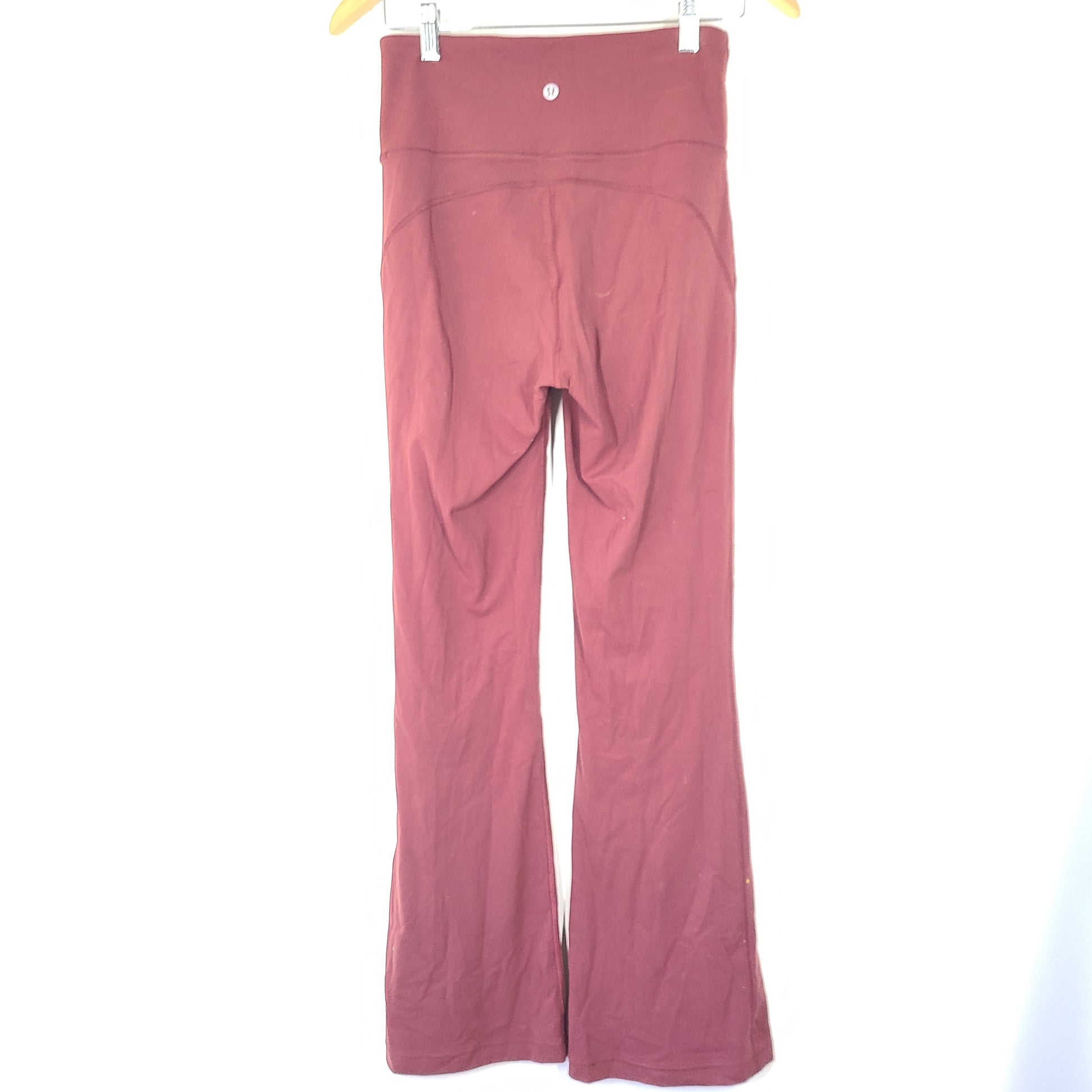 A pair of maroon Lululemon Yoga Pants in size 8