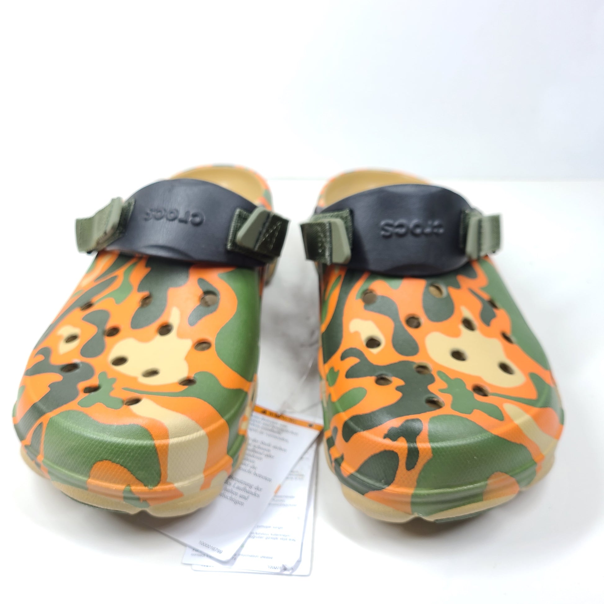 A pair of camouflage Crocs Classic clogs for men and women.