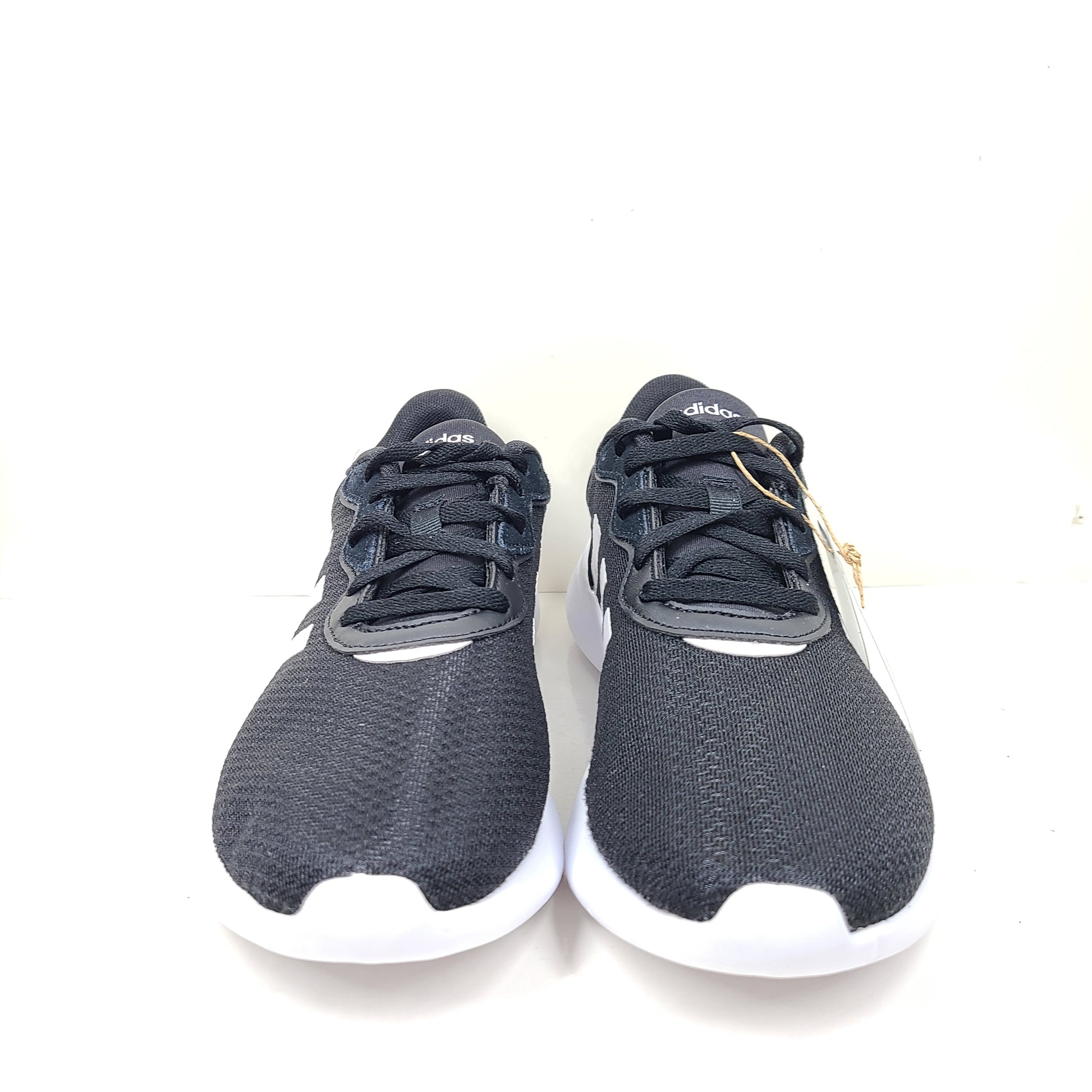 A pair of women's Adidas QT Racer 3.0 running shoes in size 7.5 with cloudfoam sole and END PLASTIC WASTE detail.