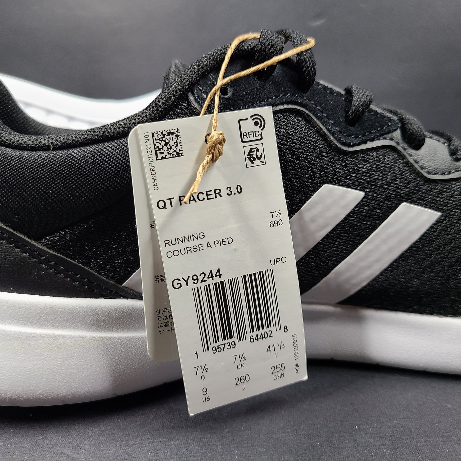 A pair of women's Adidas QT Racer 3.0 running shoes in size 7.5 with cloudfoam sole and END PLASTIC WASTE detail.