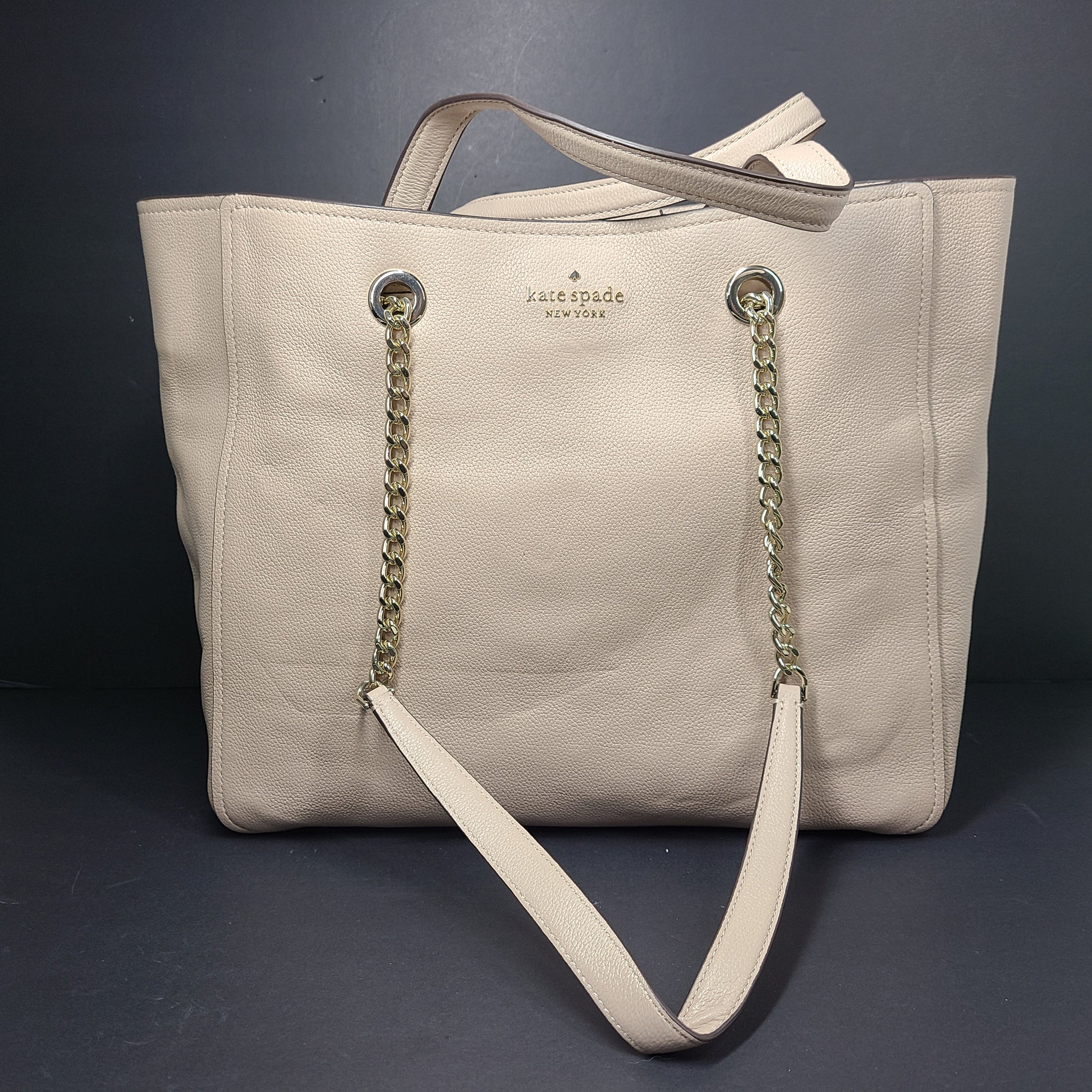 Beige Kate Spade leather tote with chain handles and gold hardware