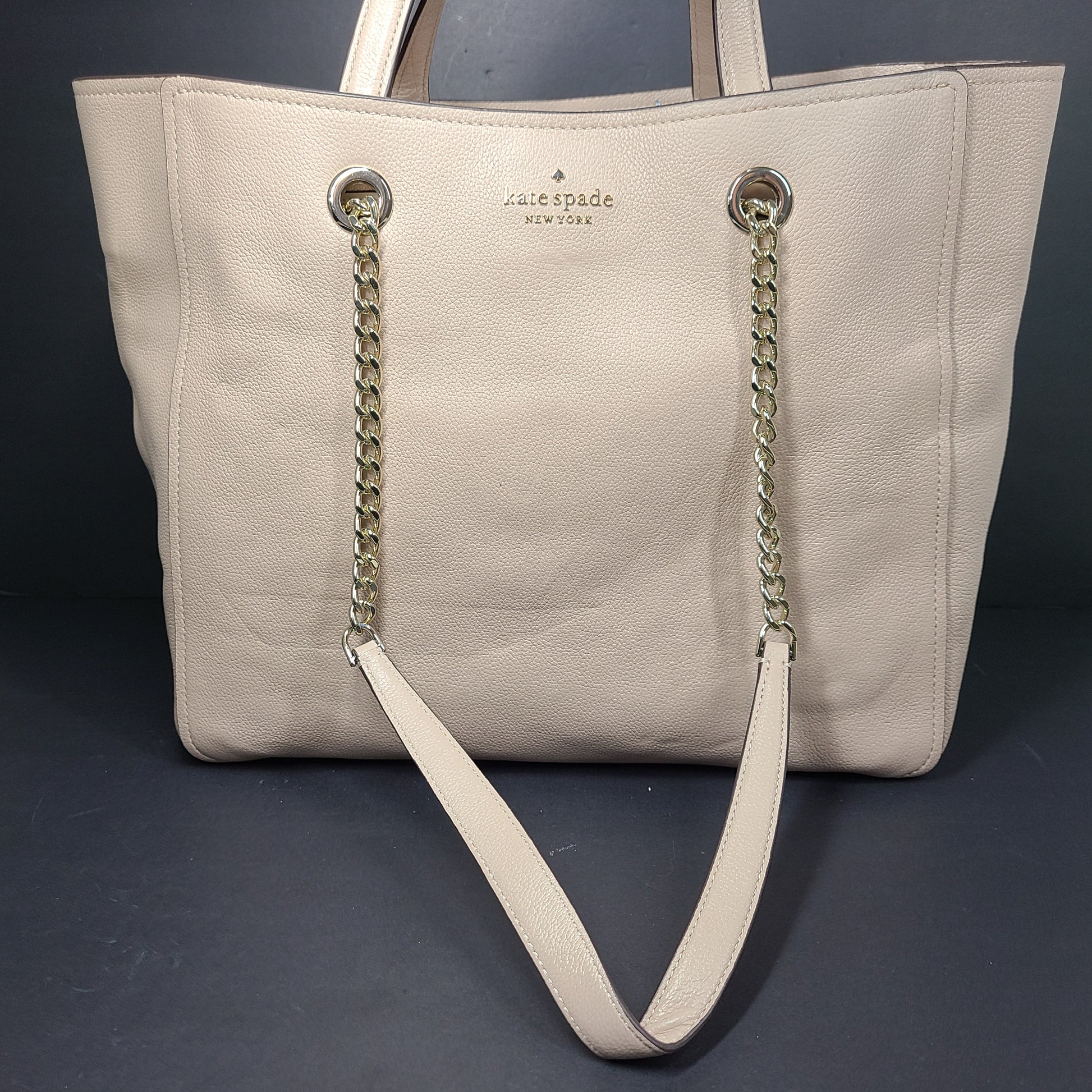 Beige Kate Spade leather tote with chain handles and gold hardware