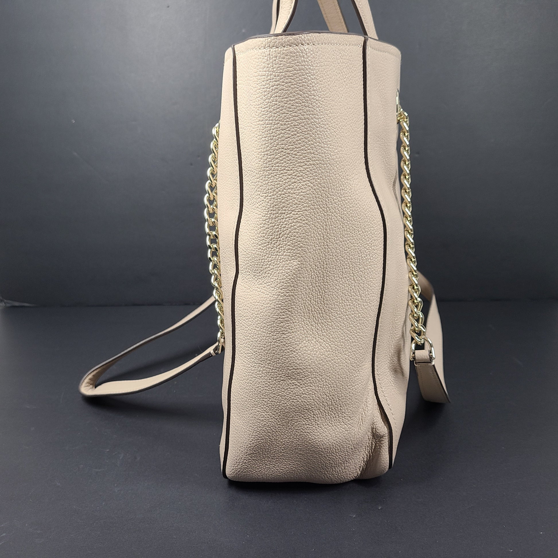 Beige Kate Spade leather tote with chain handles and gold hardware