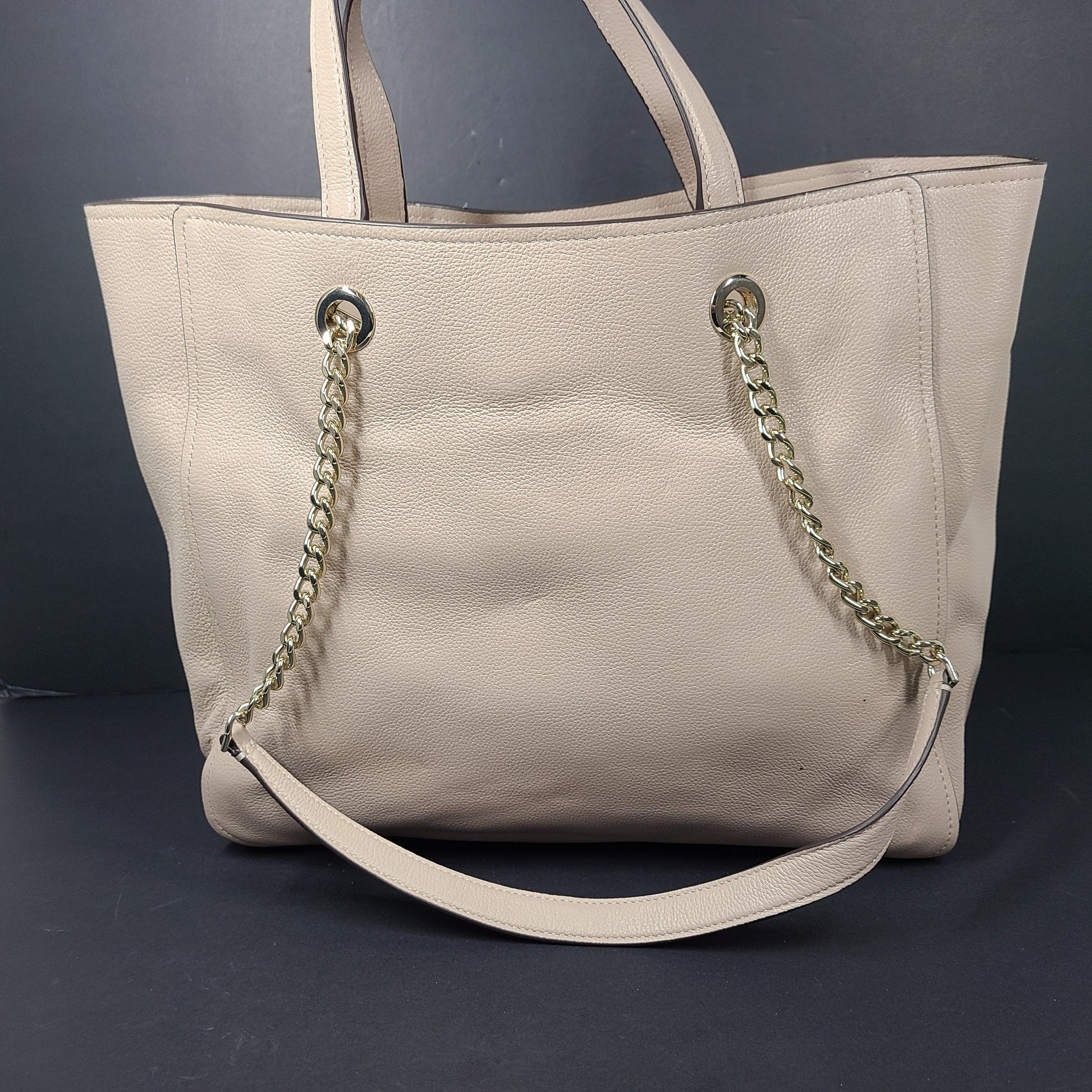 Beige Kate Spade leather tote with chain handles and gold hardware