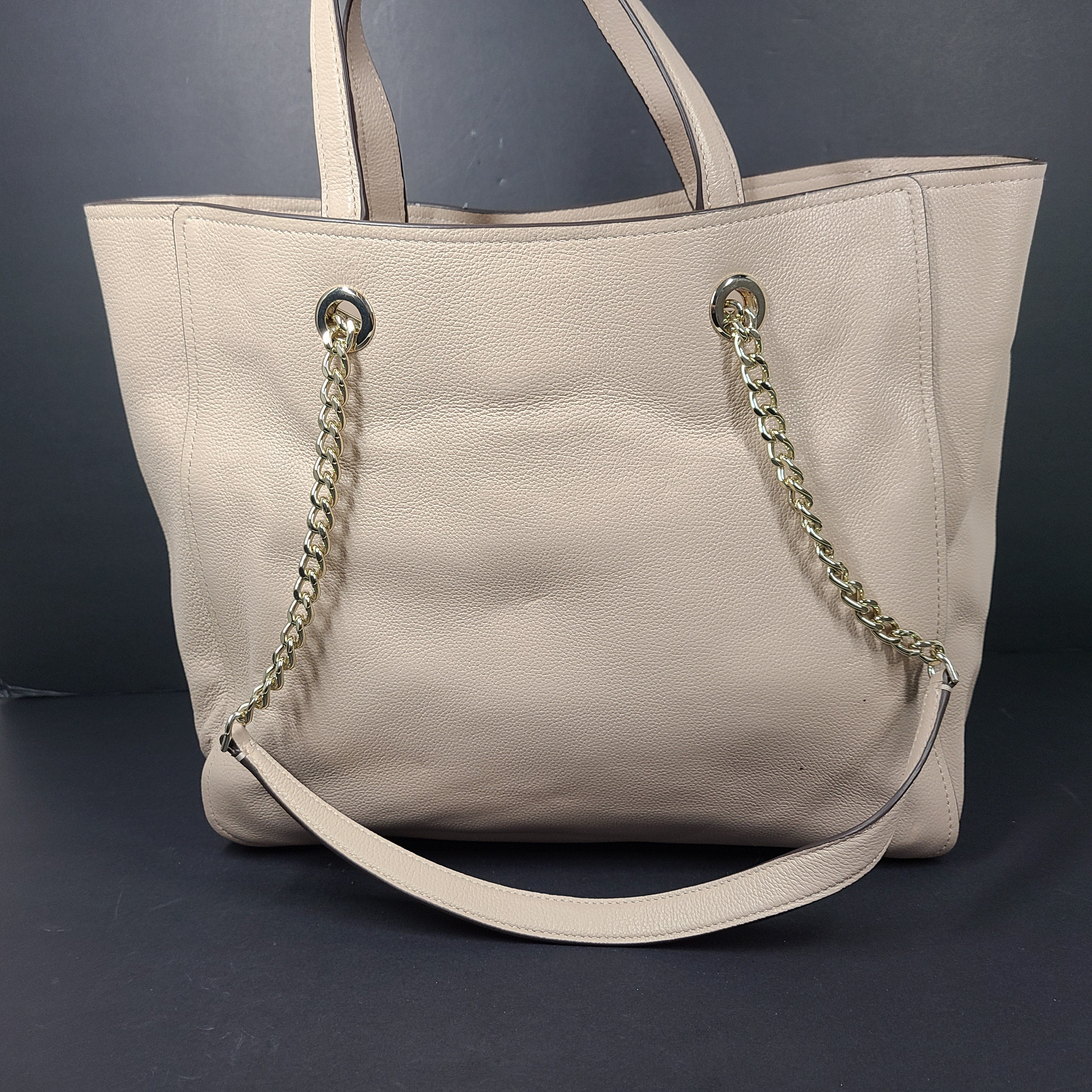 Beige Kate Spade leather tote with chain handles and gold hardware