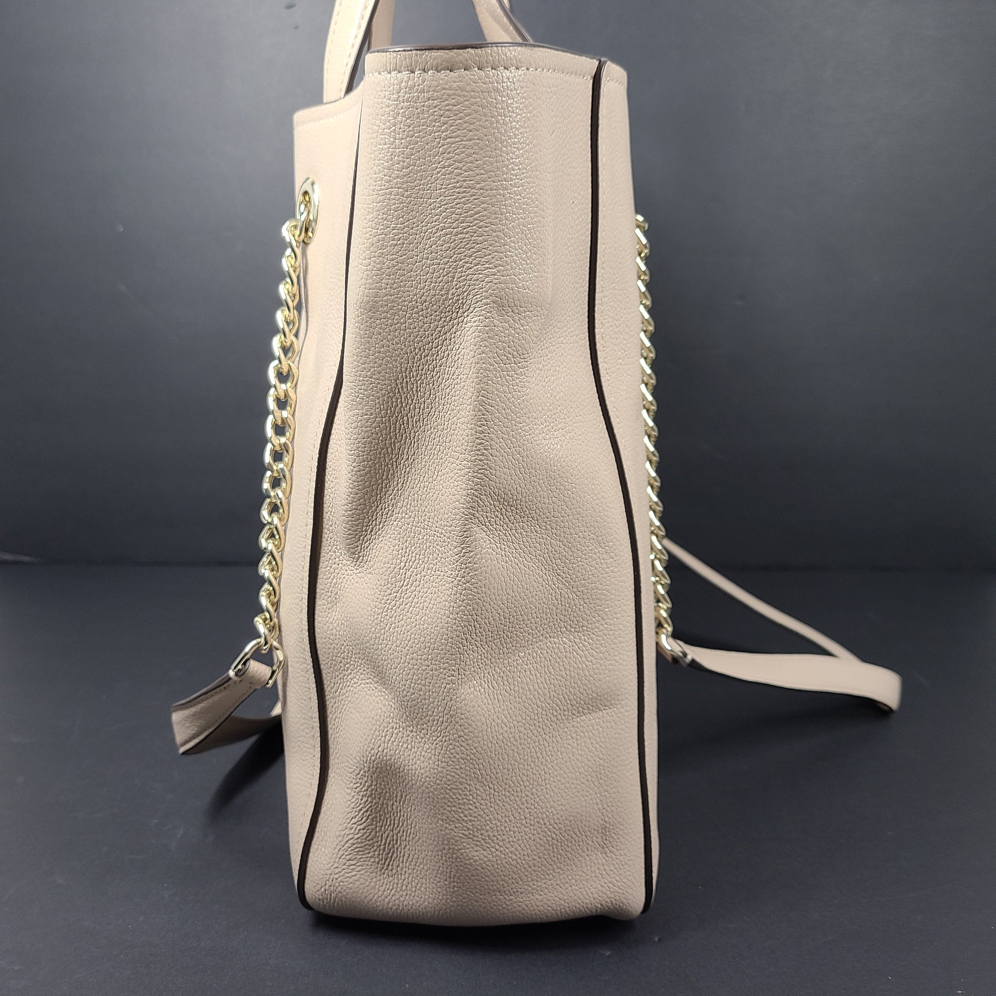 Beige Kate Spade leather tote with chain handles and gold hardware