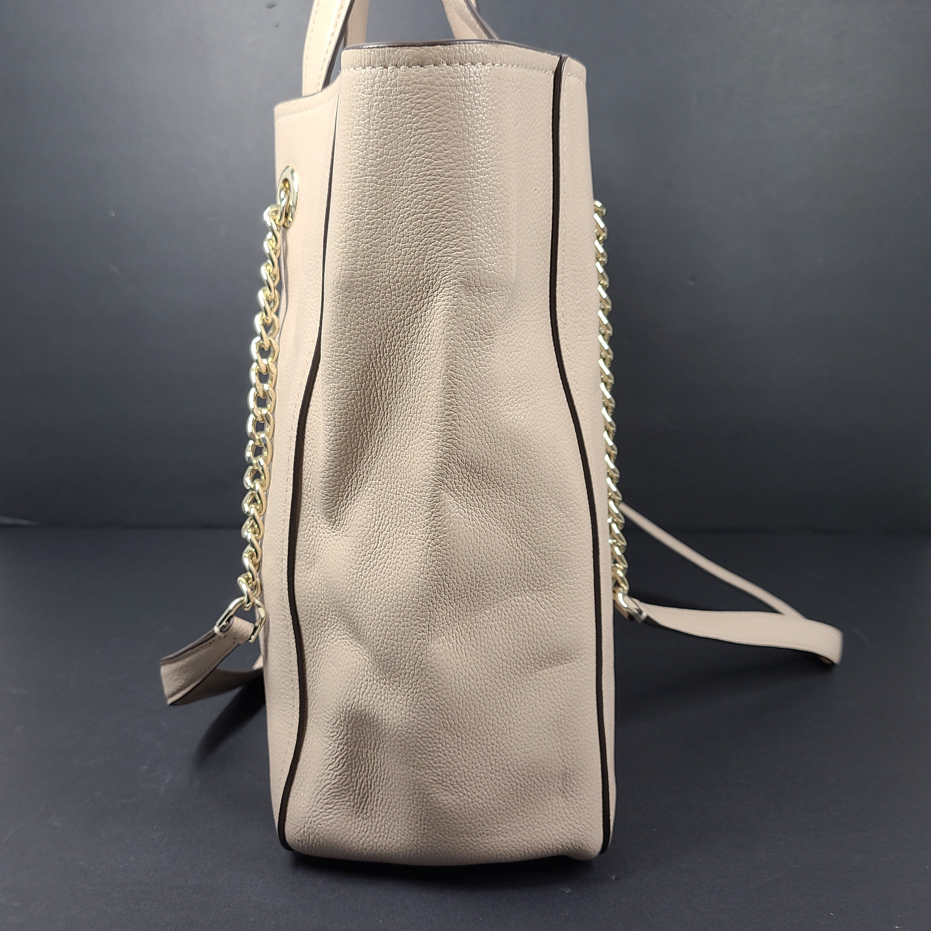 Beige Kate Spade leather tote with chain handles and gold hardware