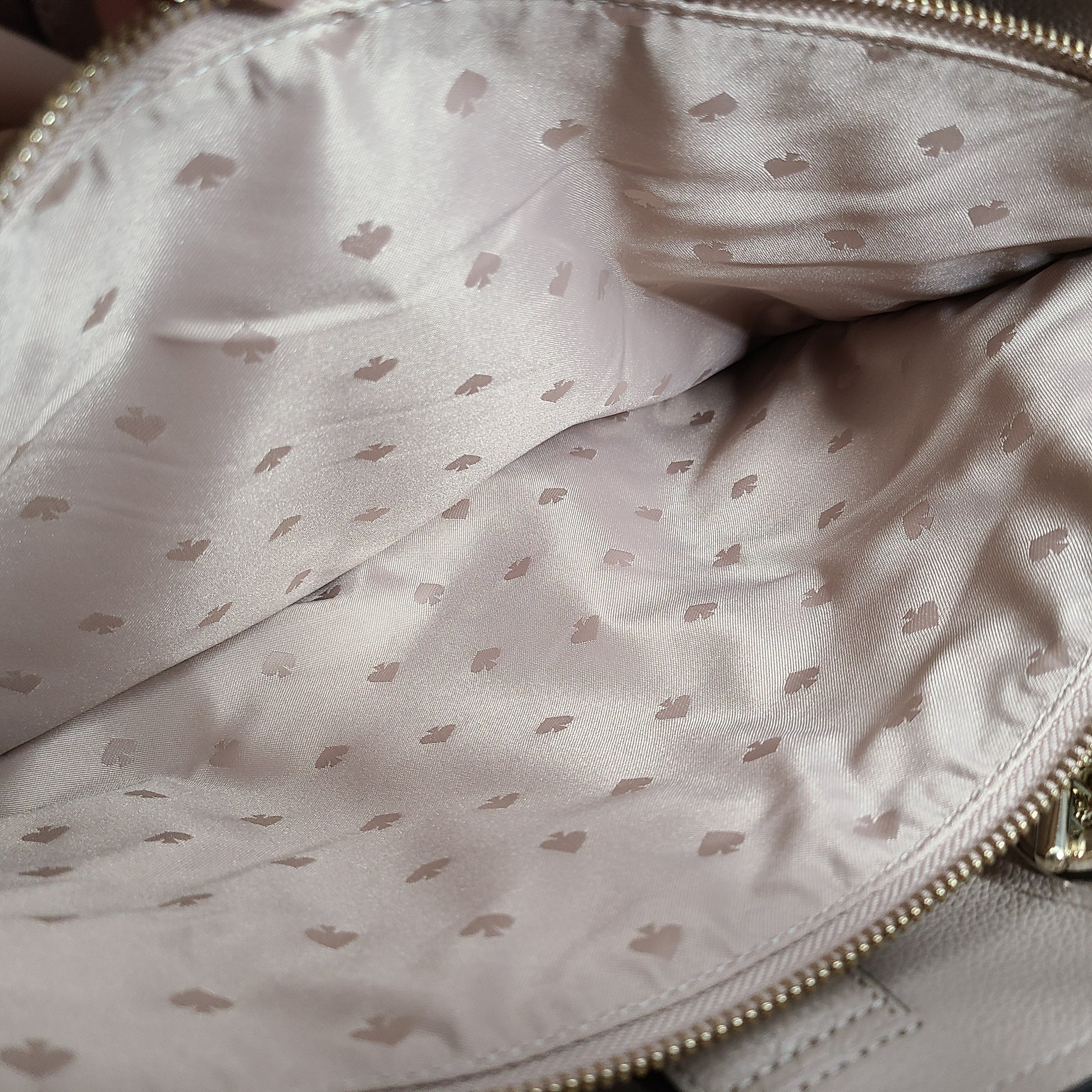 Beige Kate Spade leather tote with chain handles and gold hardware