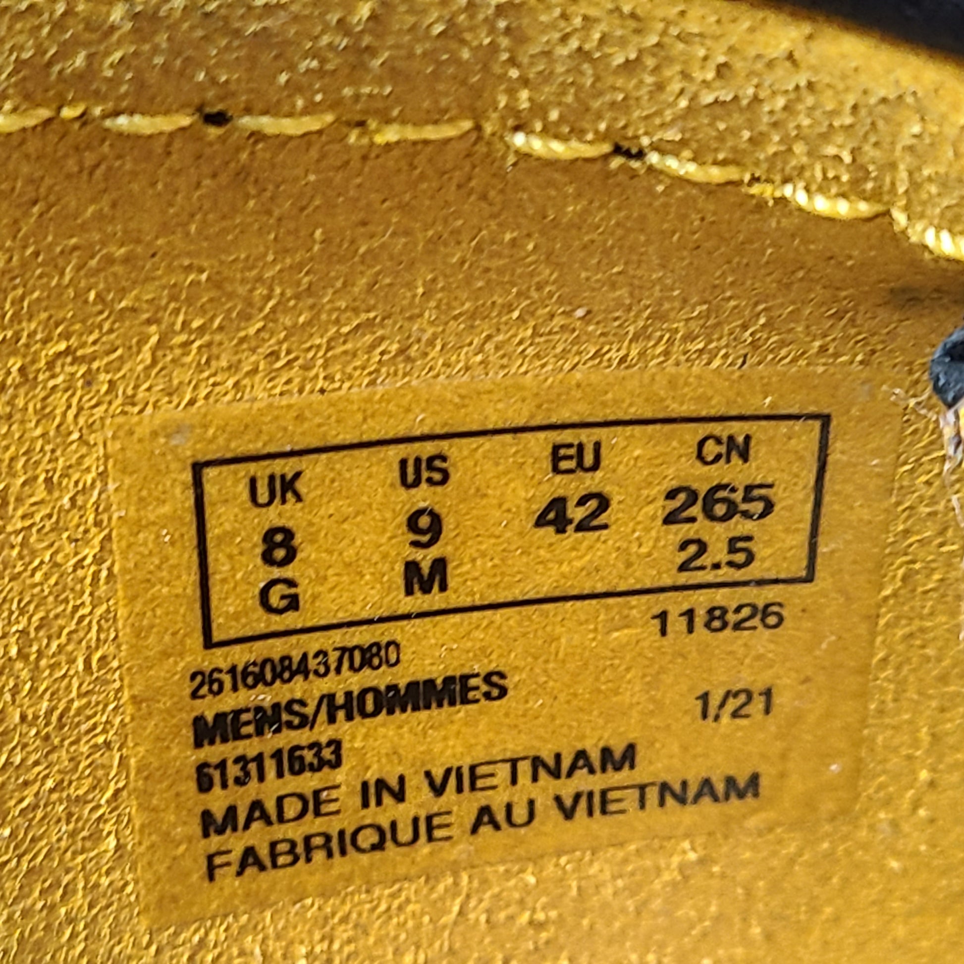 A pair of vibrant yellow Clarks Originals Jamaica Bee shoes.