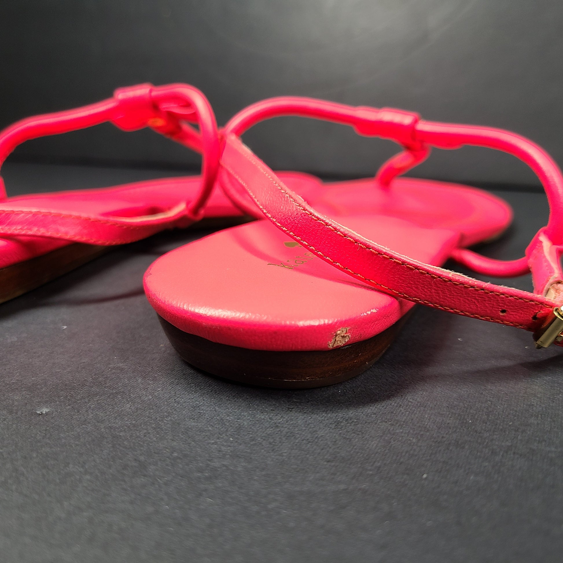 A pair of pink Kate Spade New York sandals