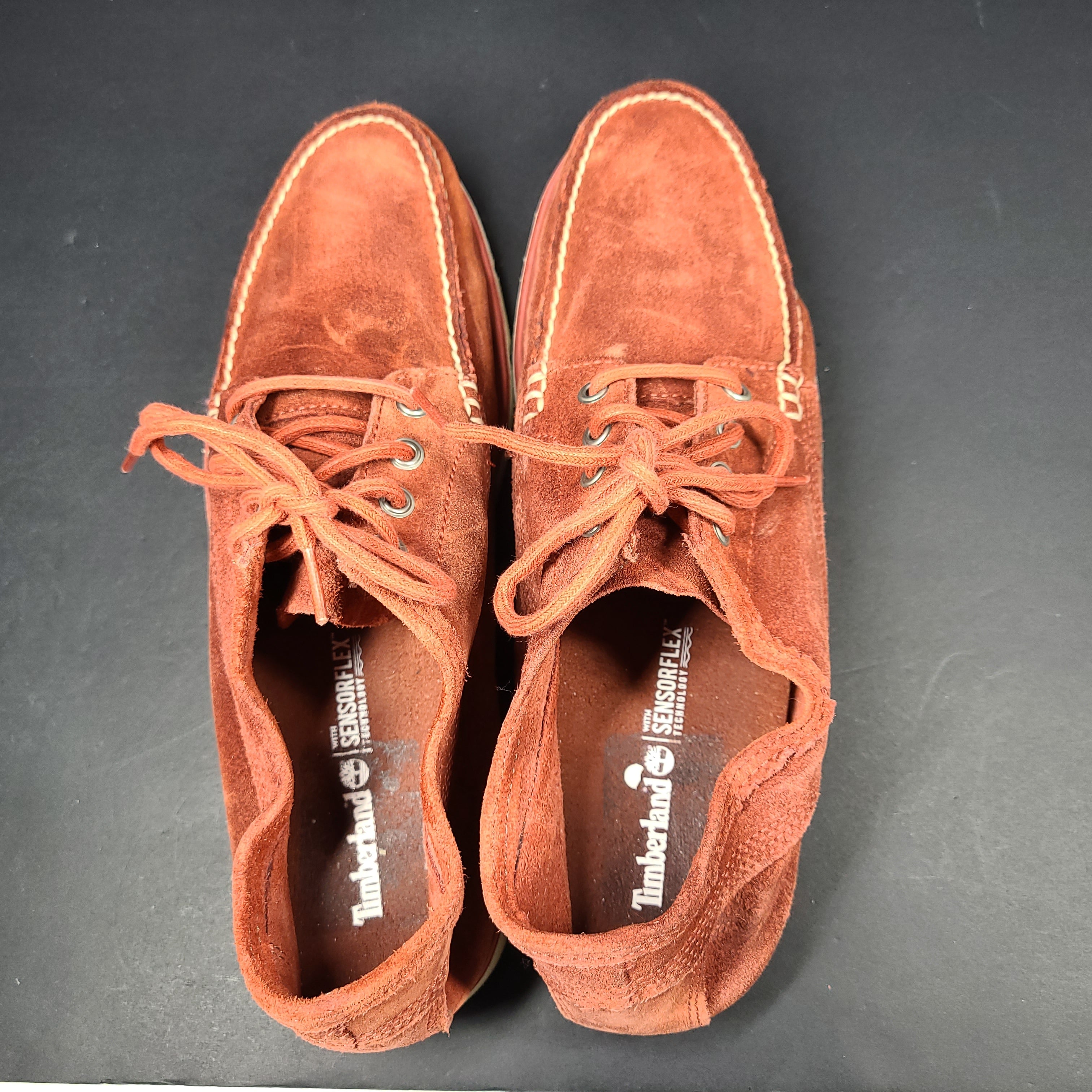 A pair of men's Timberland SensorFlex suede shoes in a rustic color