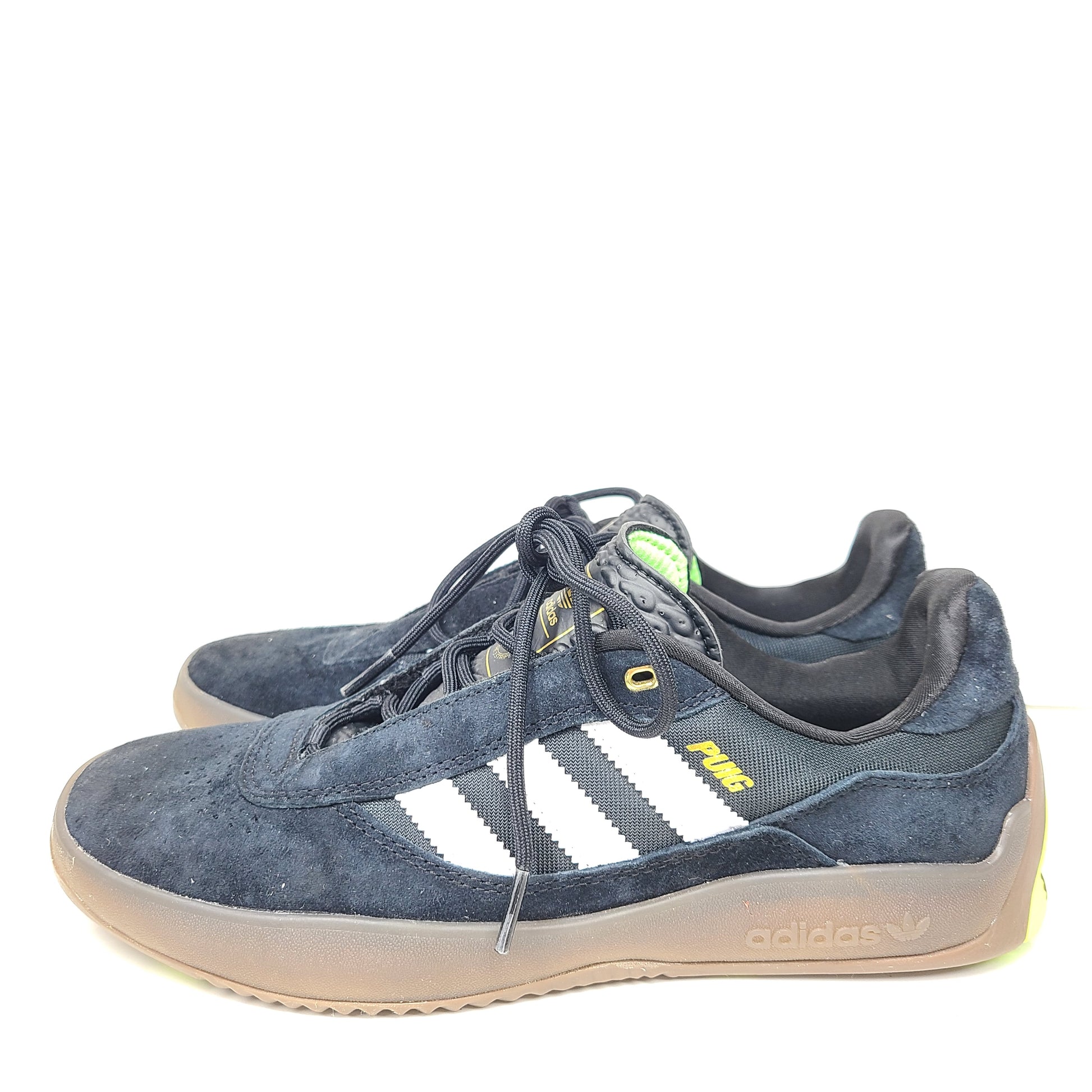 A pair of black Adidas Originals sneakers with model number FV5932.