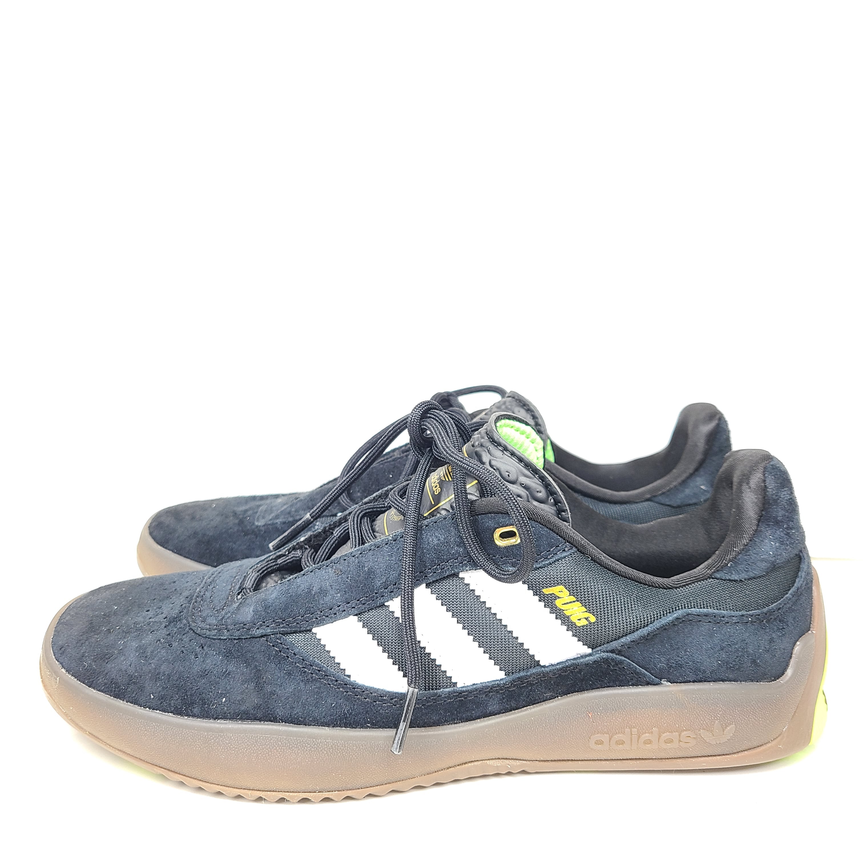 A pair of black Adidas Originals sneakers with model number FV5932.