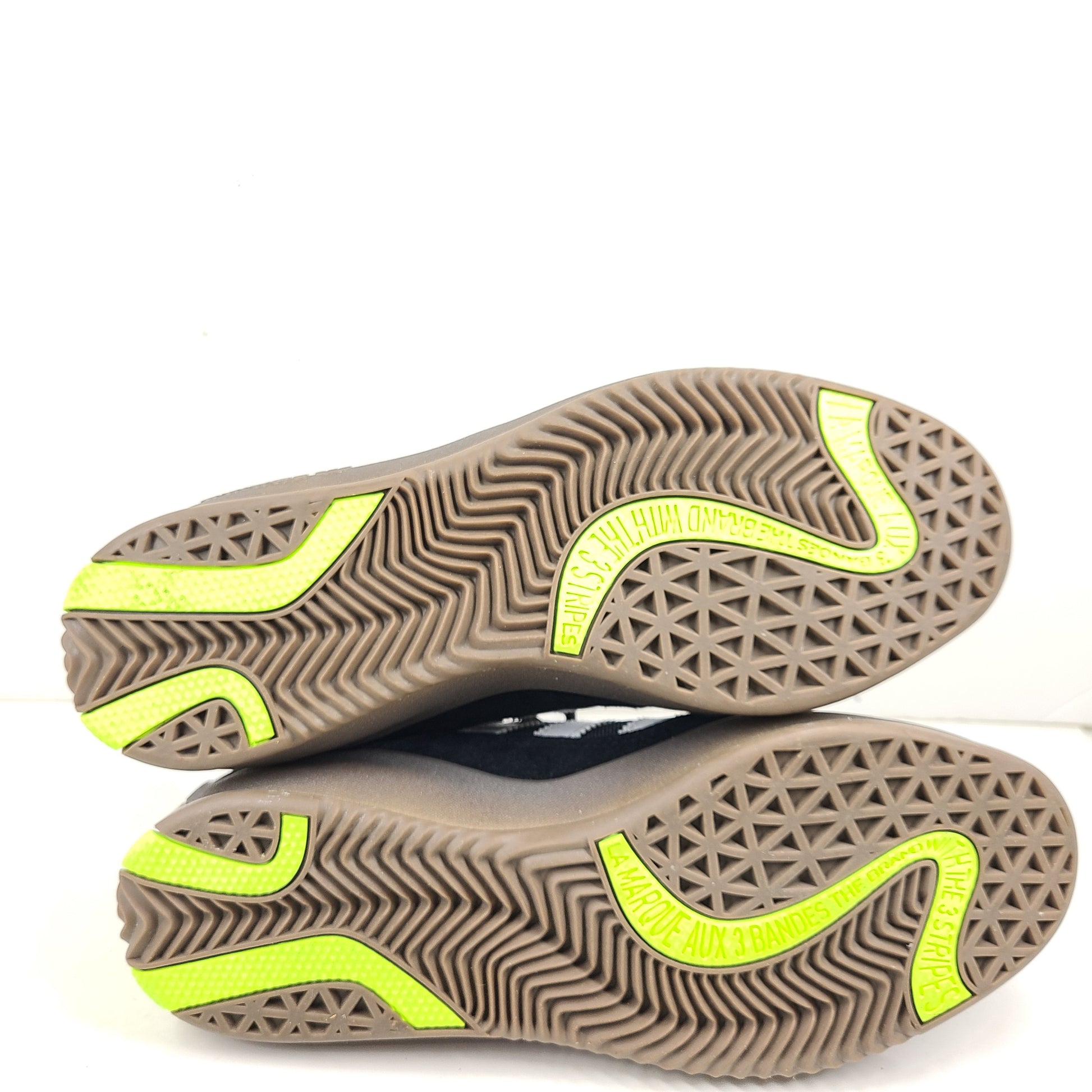 A pair of black Adidas Originals sneakers with model number FV5932.