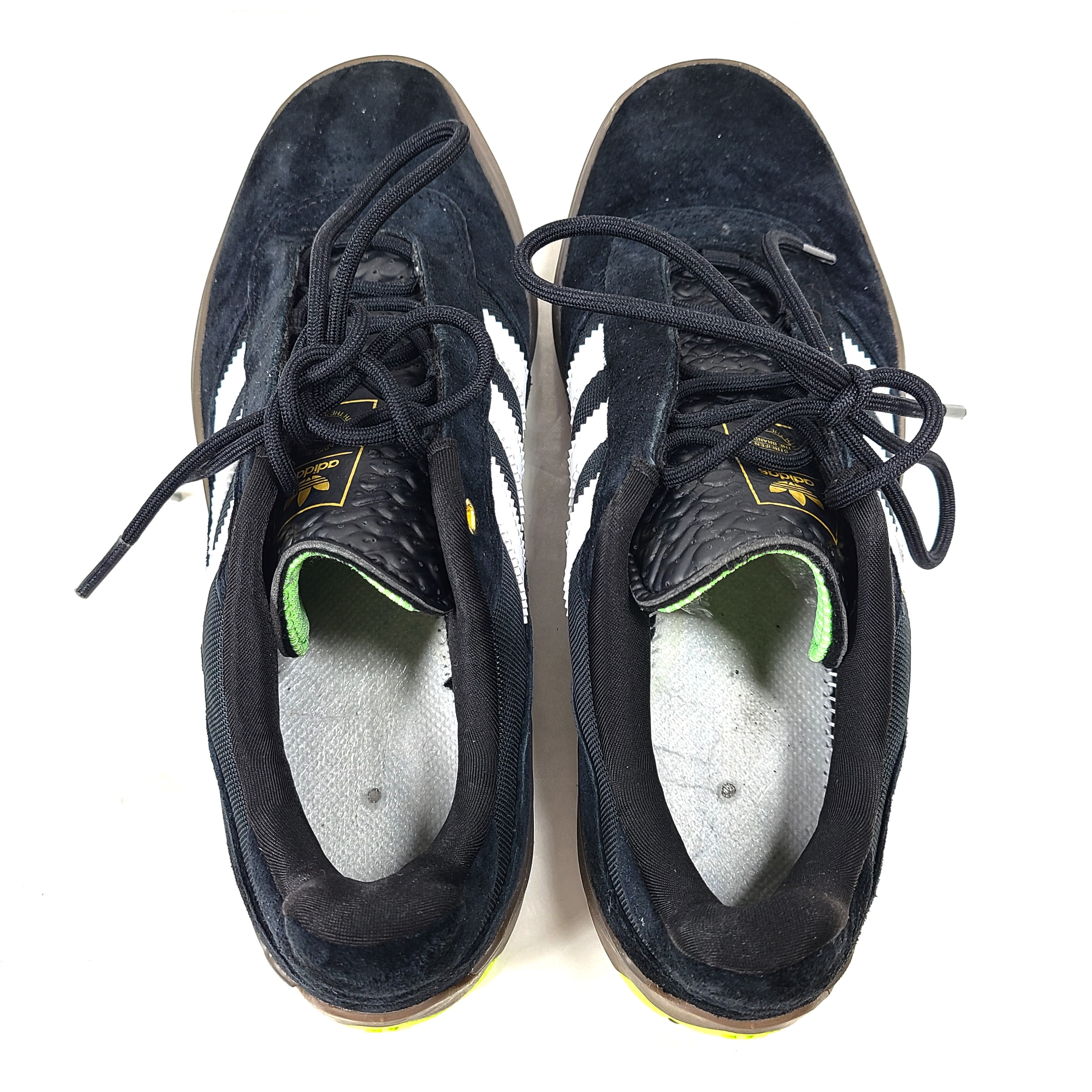 A pair of black Adidas Originals sneakers with model number FV5932.