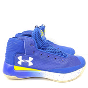 A pair of blue and yellow Under Armour basketball sneakers