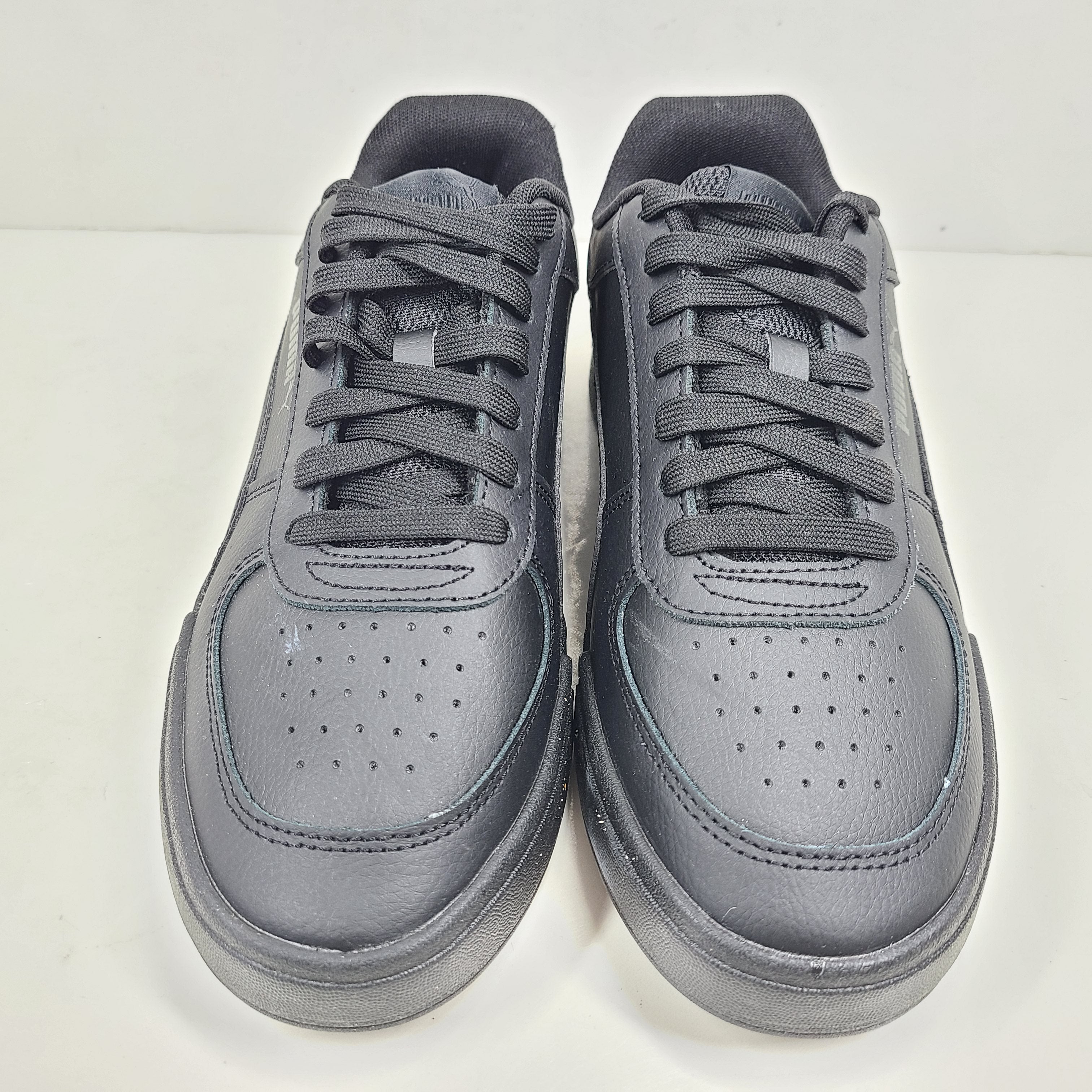 A pair of black men's Puma SoftFoam shoes