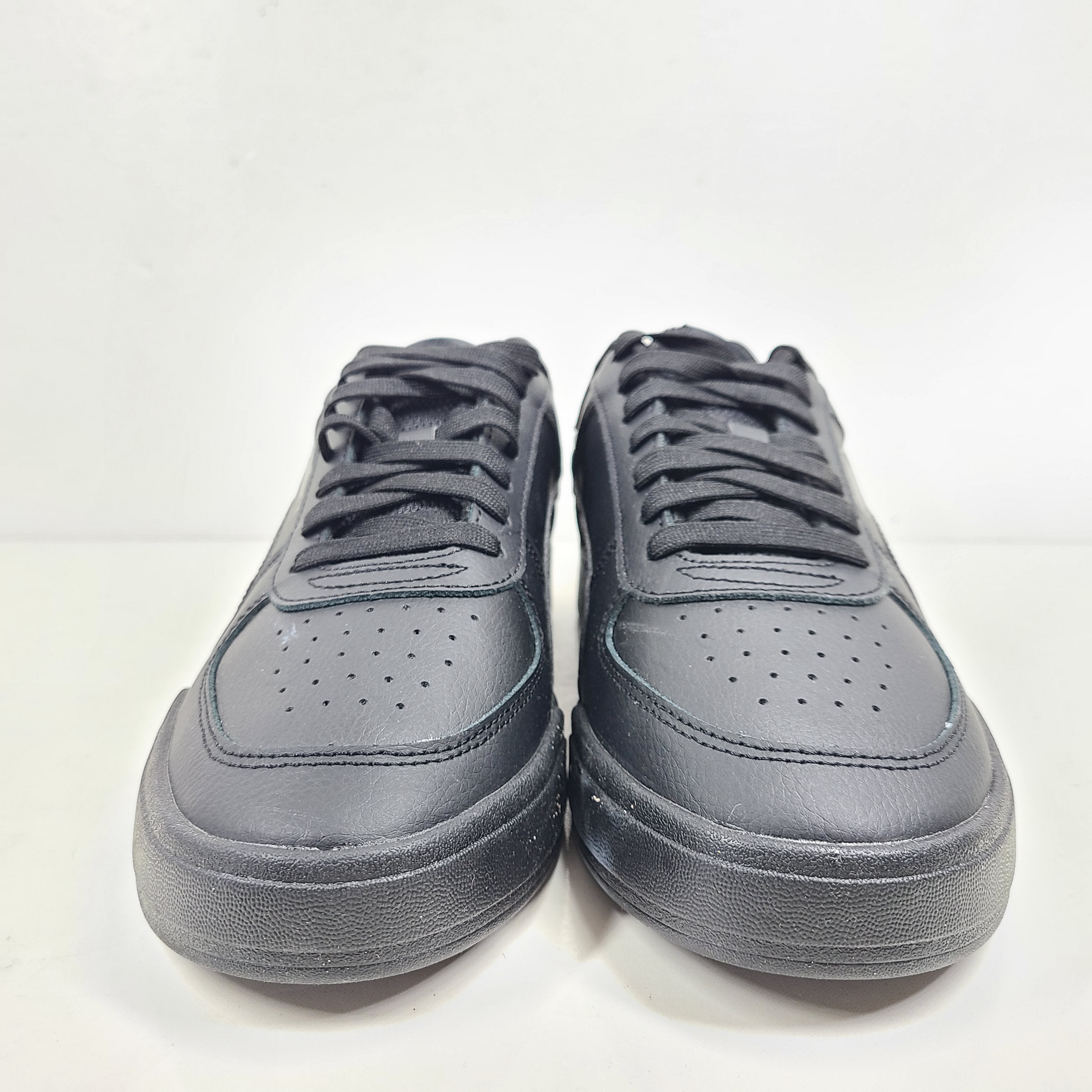 A pair of black men's Puma SoftFoam shoes