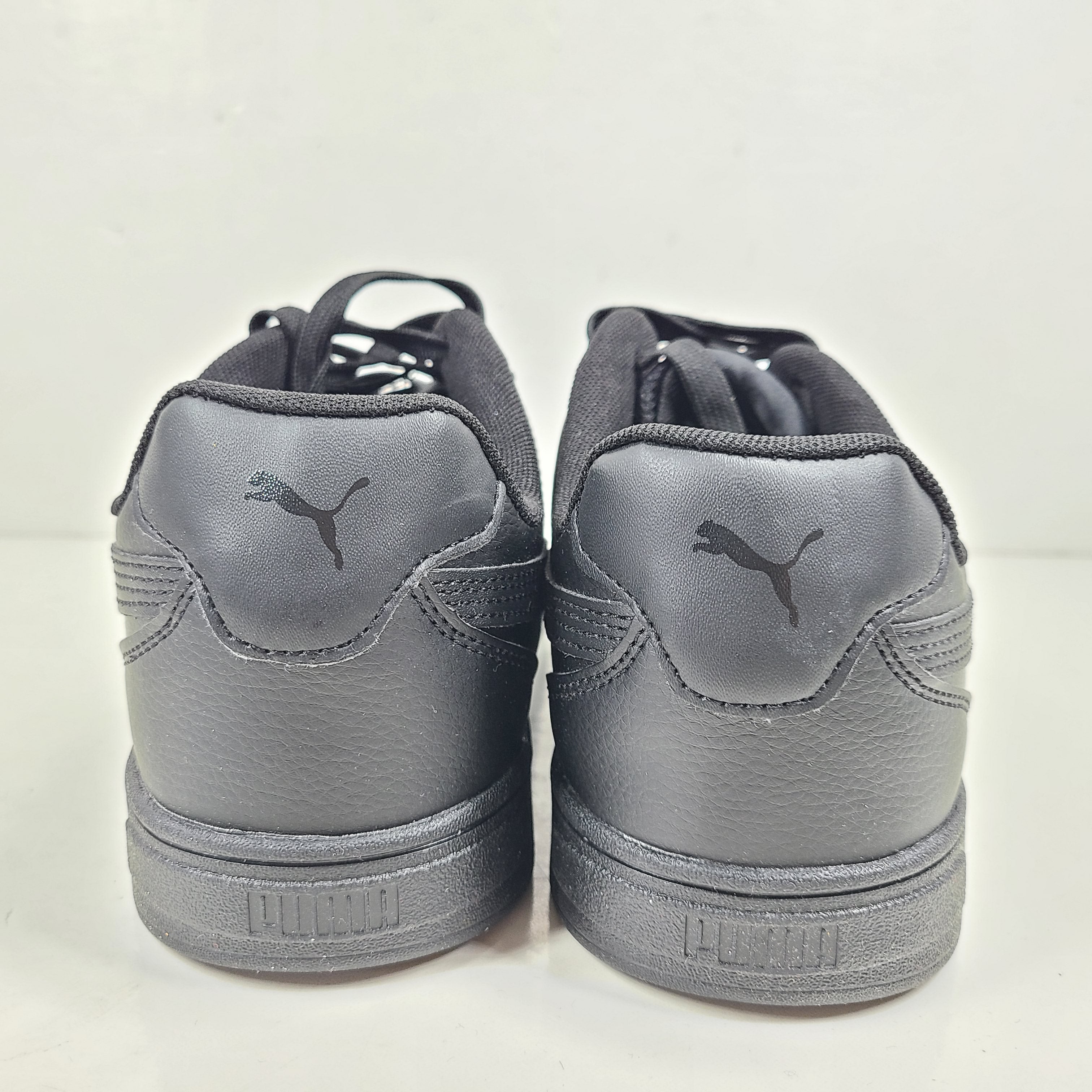 A pair of black men's Puma SoftFoam shoes
