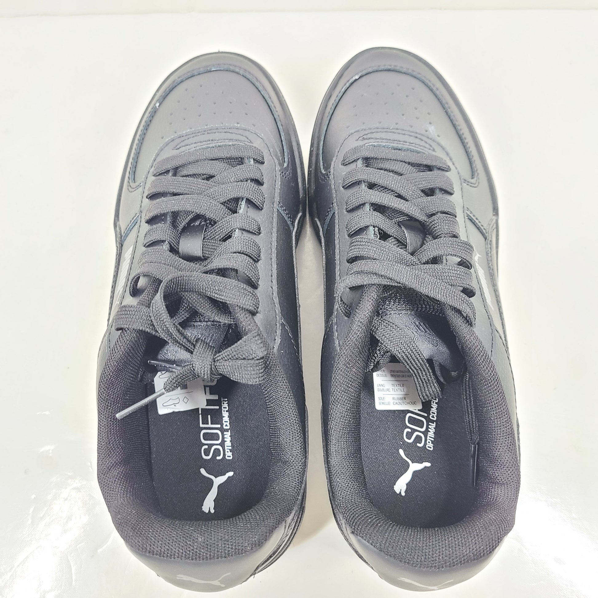 A pair of black men's Puma SoftFoam shoes