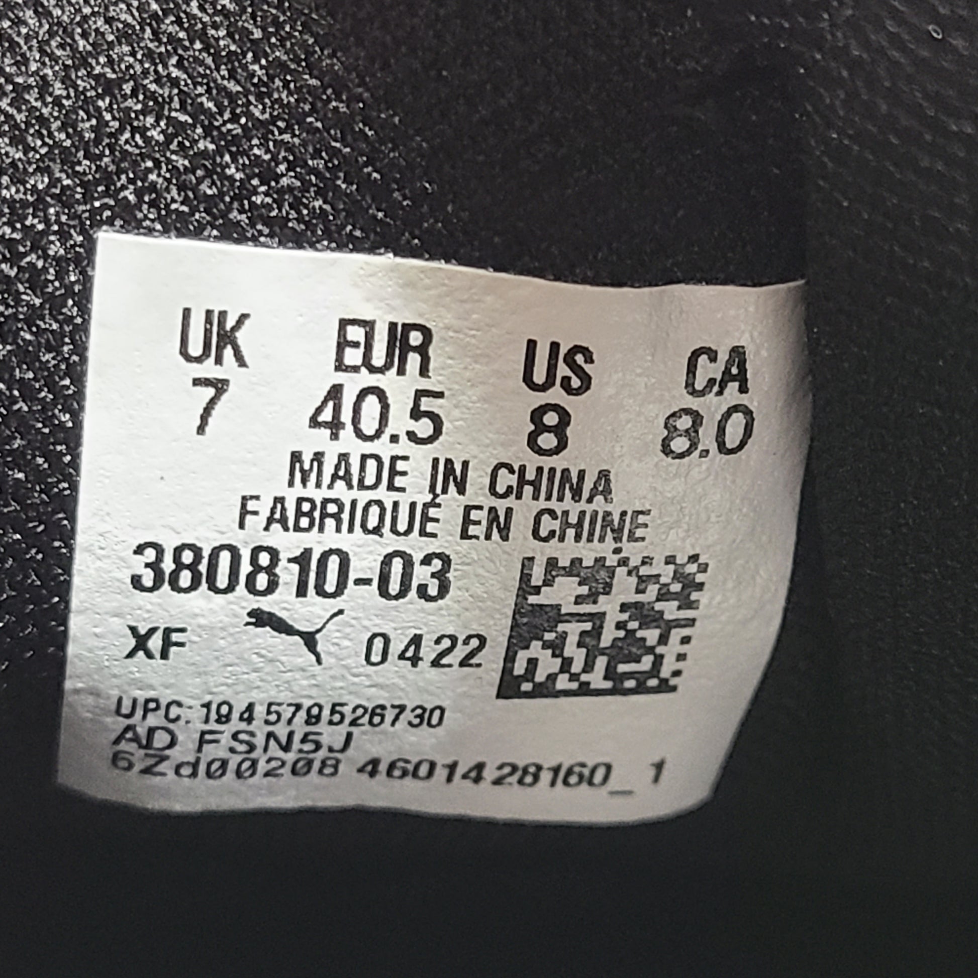 A pair of black men's Puma SoftFoam shoes