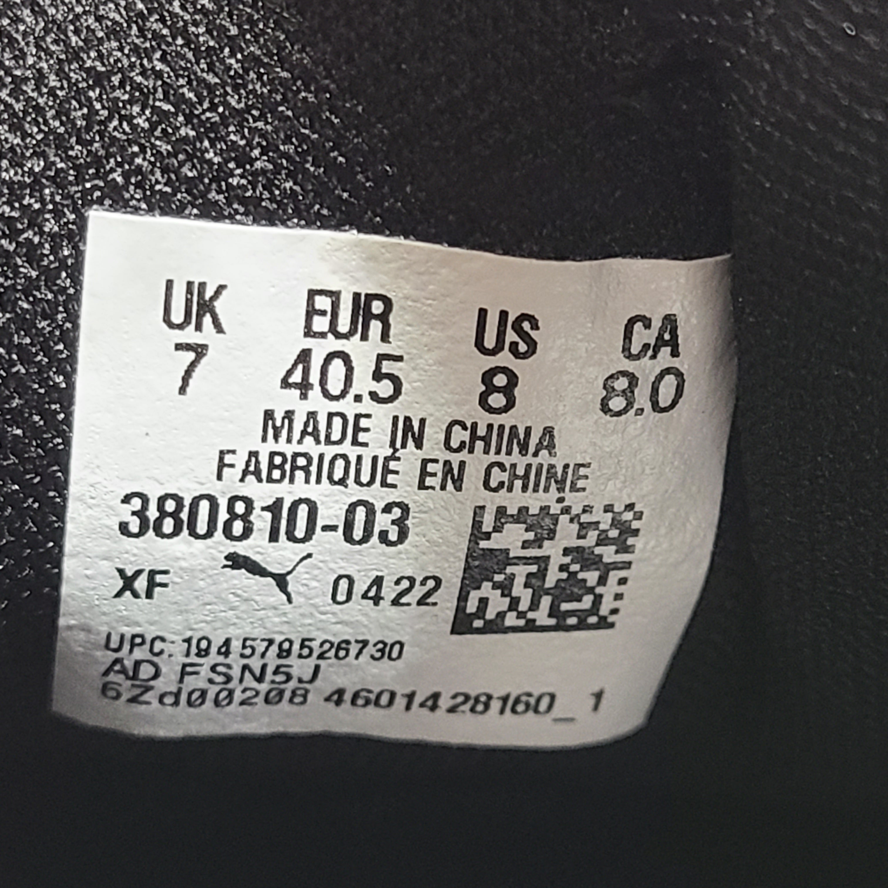 A pair of black men's Puma SoftFoam shoes