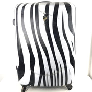A stylish zebra-print hard shell luggage by Heys