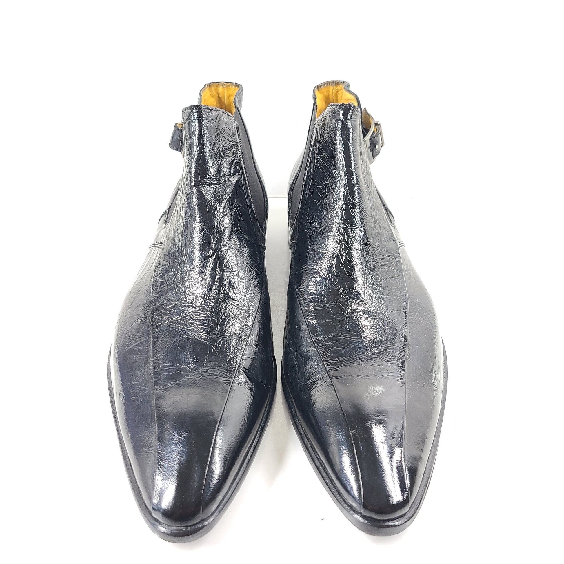 A pair of black leather Chelsea boots for men, size 44.